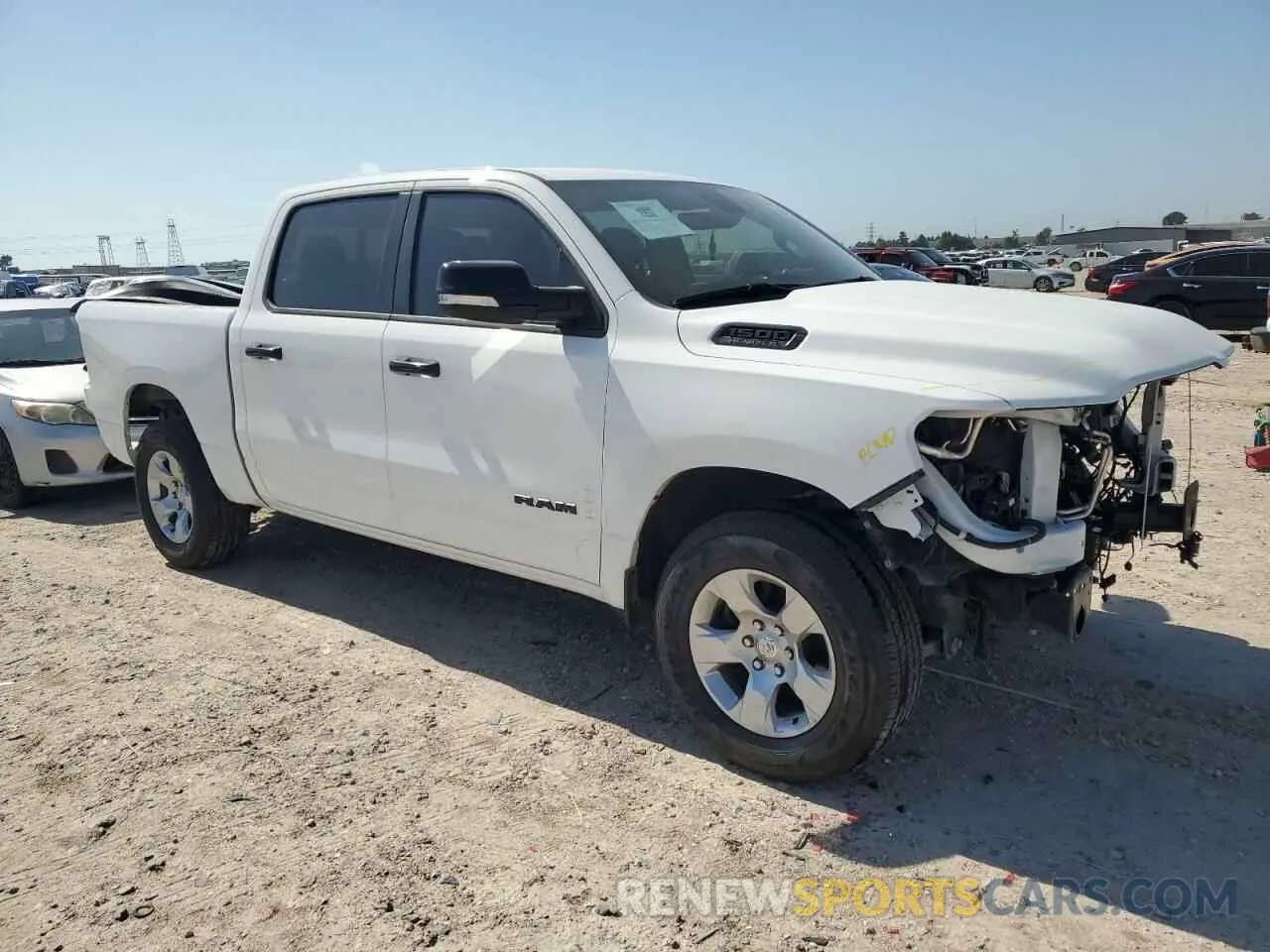 4 Photograph of a damaged car 1C6RREFT5NN389358 RAM 1500 2022