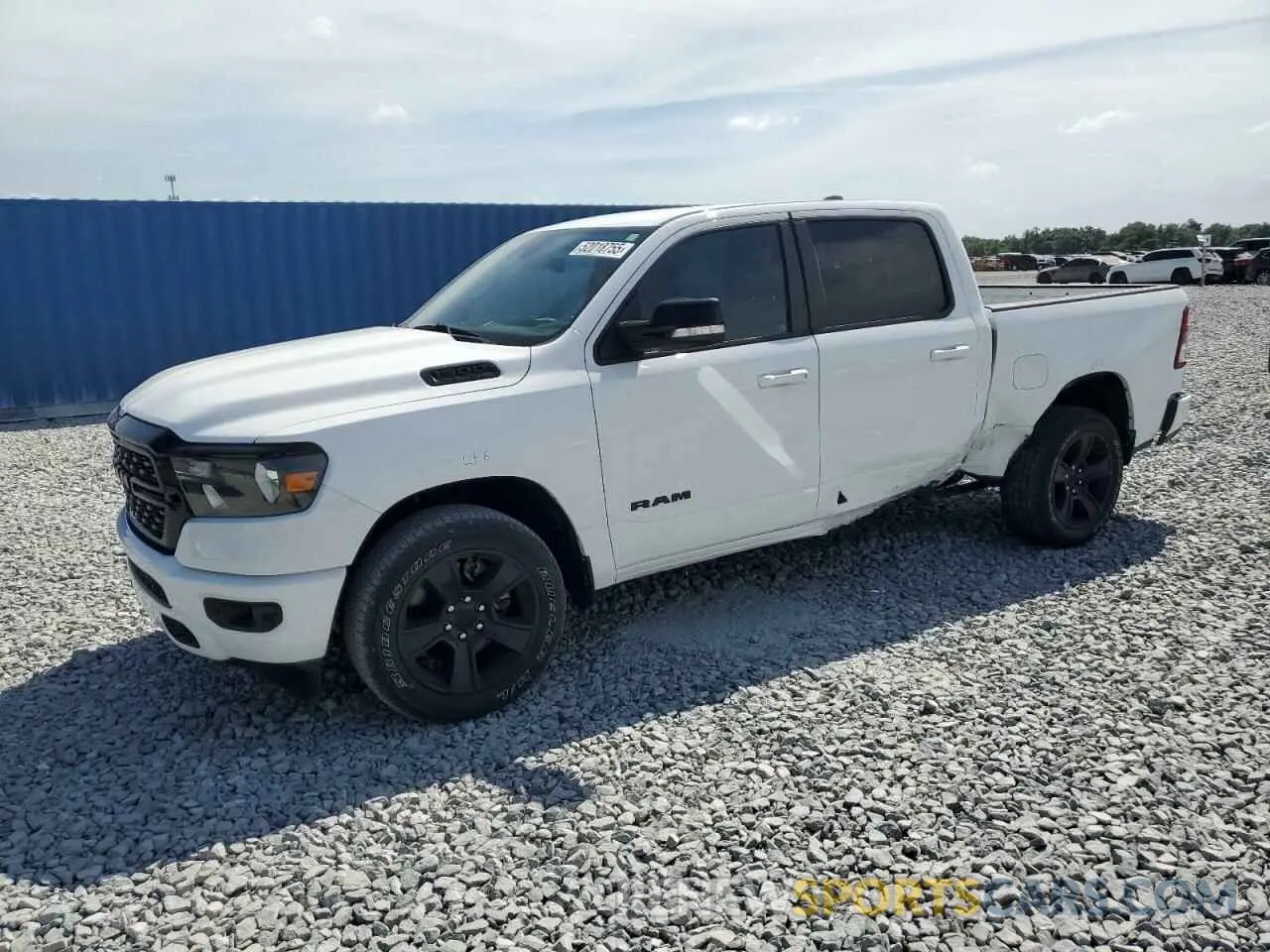 1 Photograph of a damaged car 1C6RREFT6NN312241 RAM 1500 2022