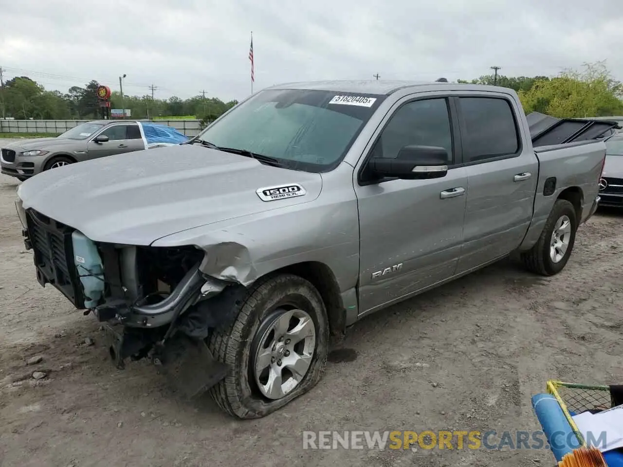 1 Photograph of a damaged car 1C6RREFT7NN113229 RAM 1500 2022