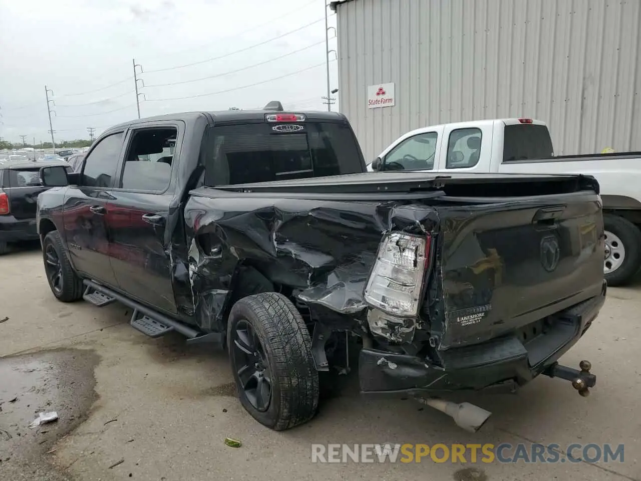 2 Photograph of a damaged car 1C6RREFT9NN276657 RAM 1500 2022