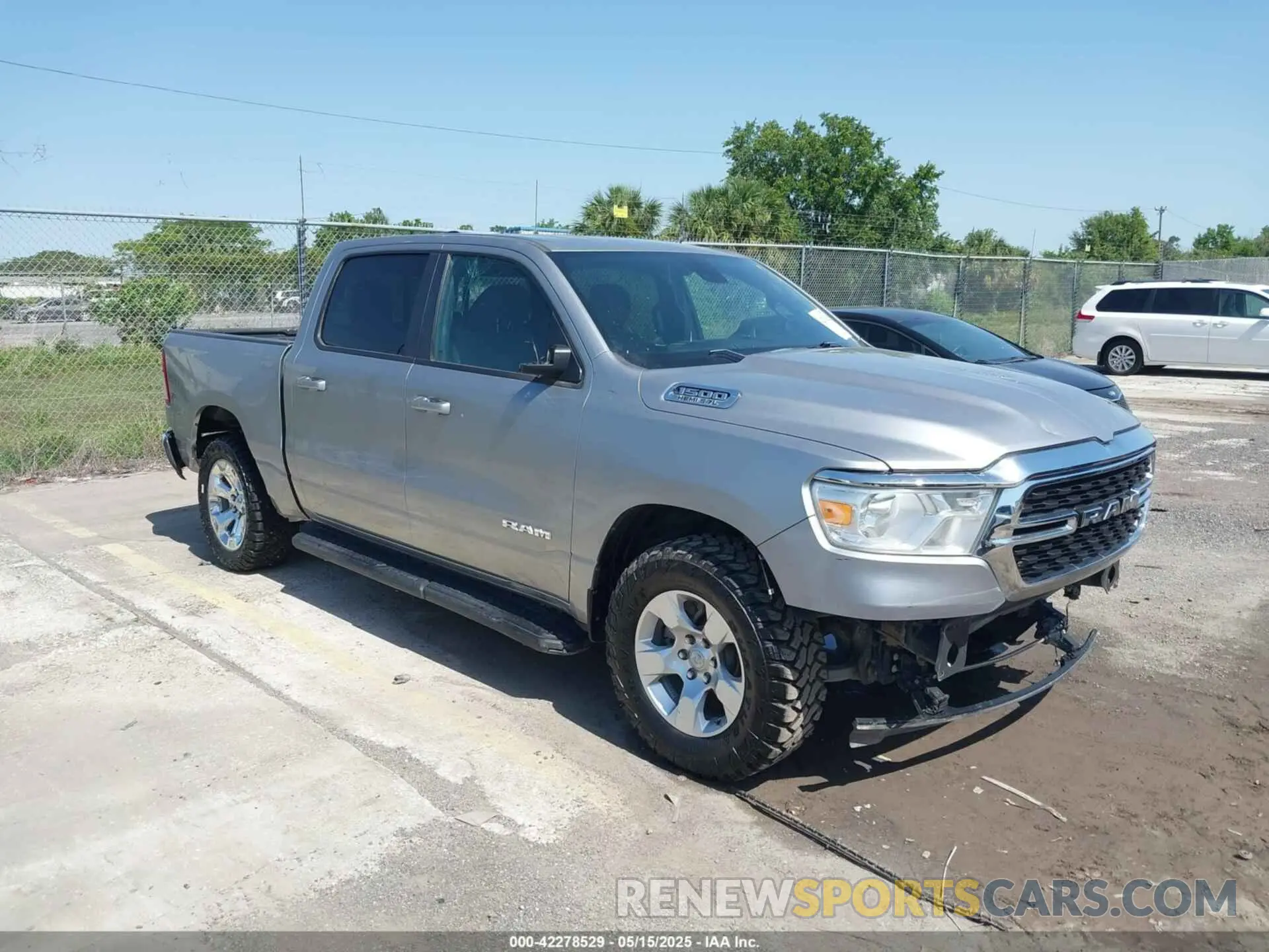 1 Photograph of a damaged car 1C6RREFTXNN254344 RAM 1500 2022