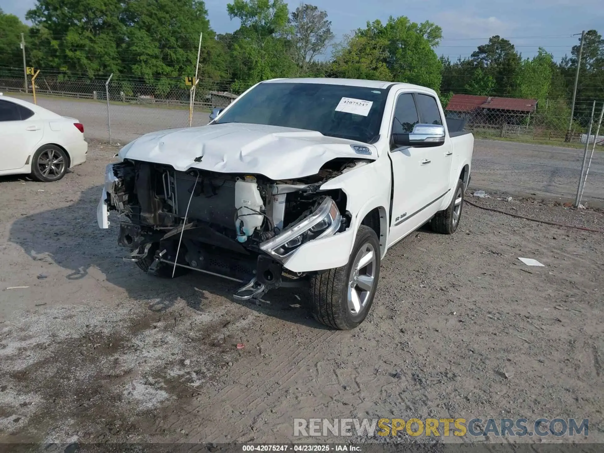 2 Photograph of a damaged car 1C6RREHT0NN187749 RAM 1500 2022