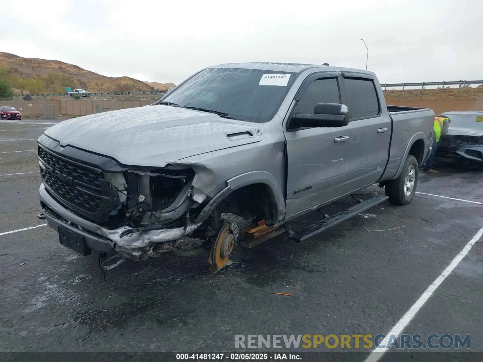 2 Photograph of a damaged car 1C6RREMT2NN246600 RAM 1500 2022