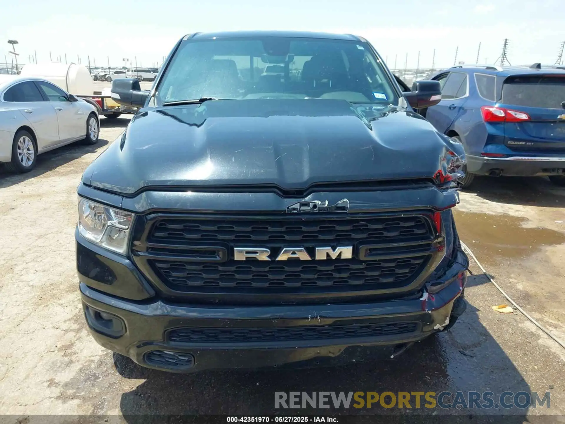 13 Photograph of a damaged car 1C6RREMT5NN324352 RAM 1500 2022