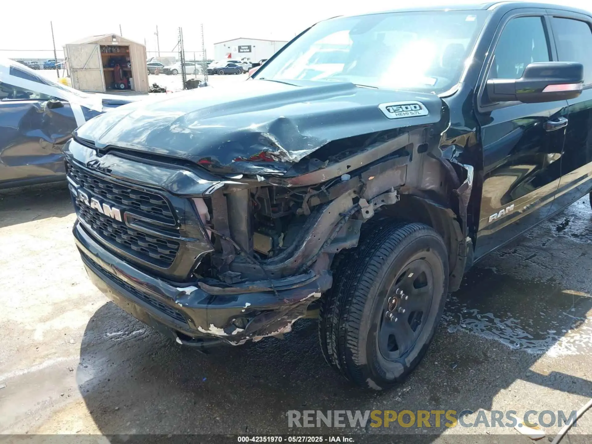 6 Photograph of a damaged car 1C6RREMT5NN324352 RAM 1500 2022