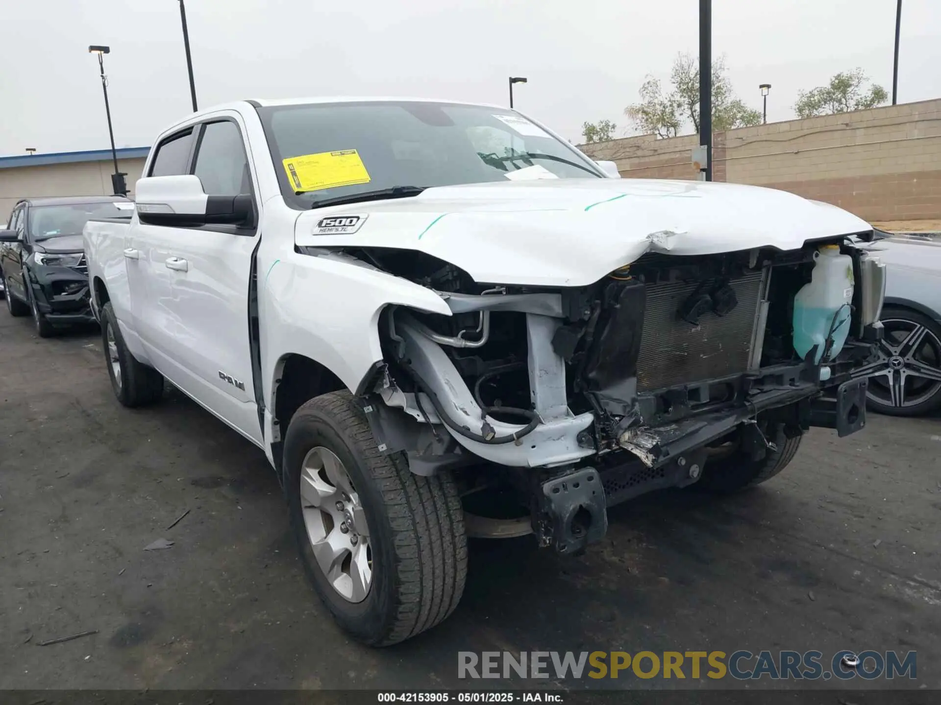 1 Photograph of a damaged car 1C6RREMT6NN464202 RAM 1500 2022