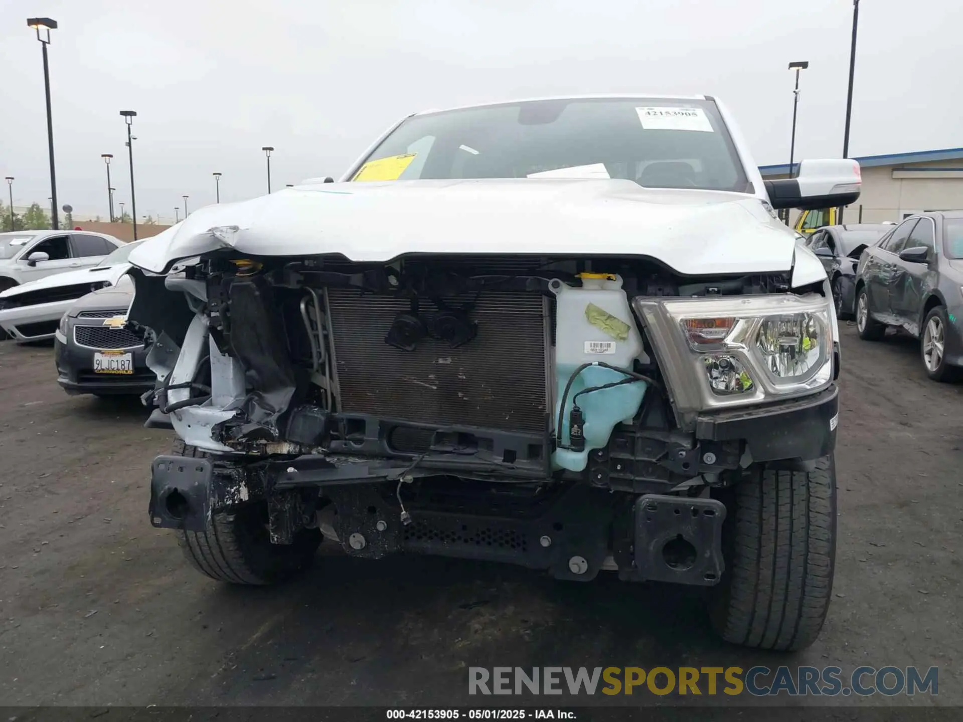 13 Photograph of a damaged car 1C6RREMT6NN464202 RAM 1500 2022