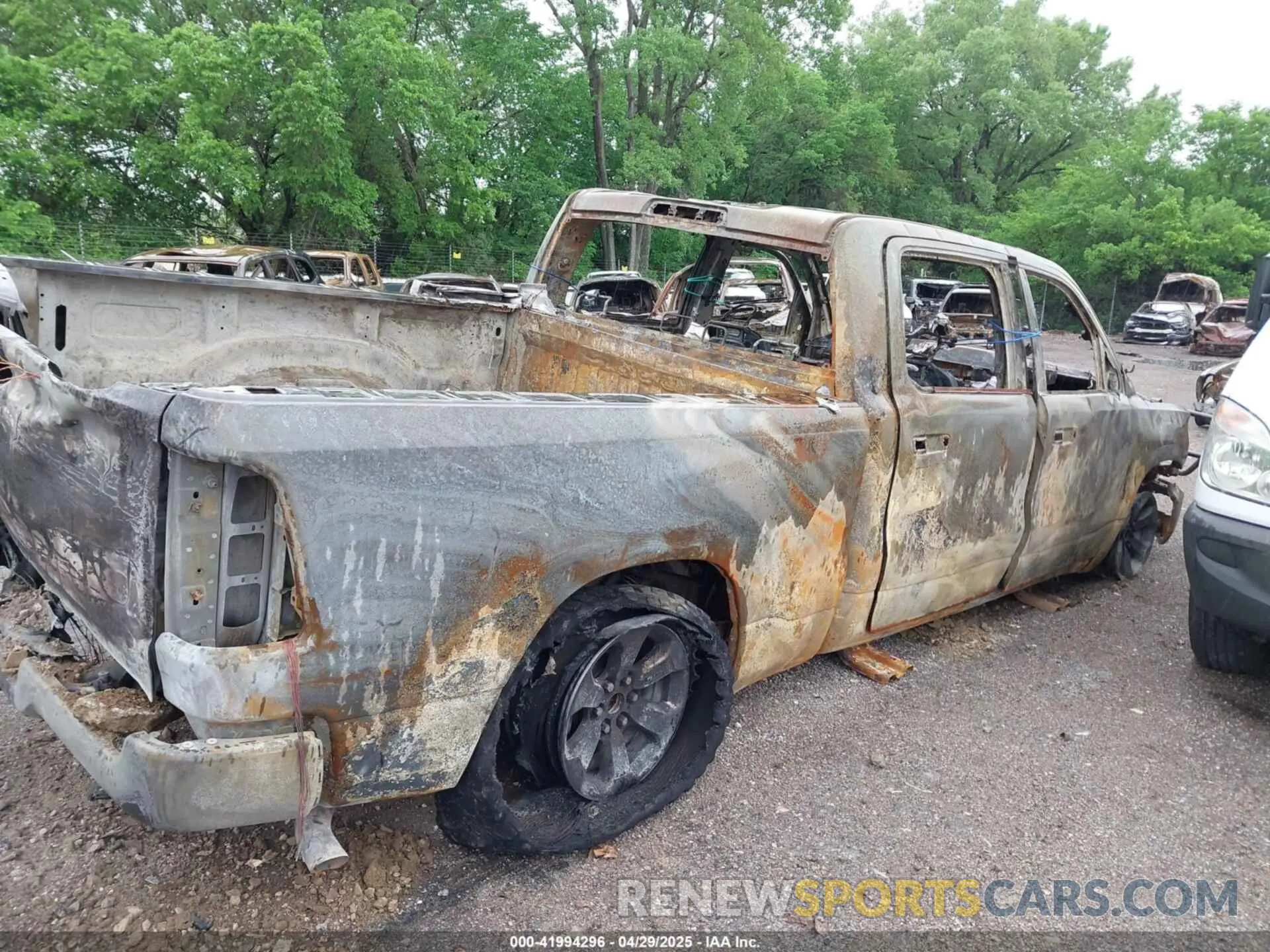 13 Photograph of a damaged car 1C6RRENT8NN451322 RAM 1500 2022
