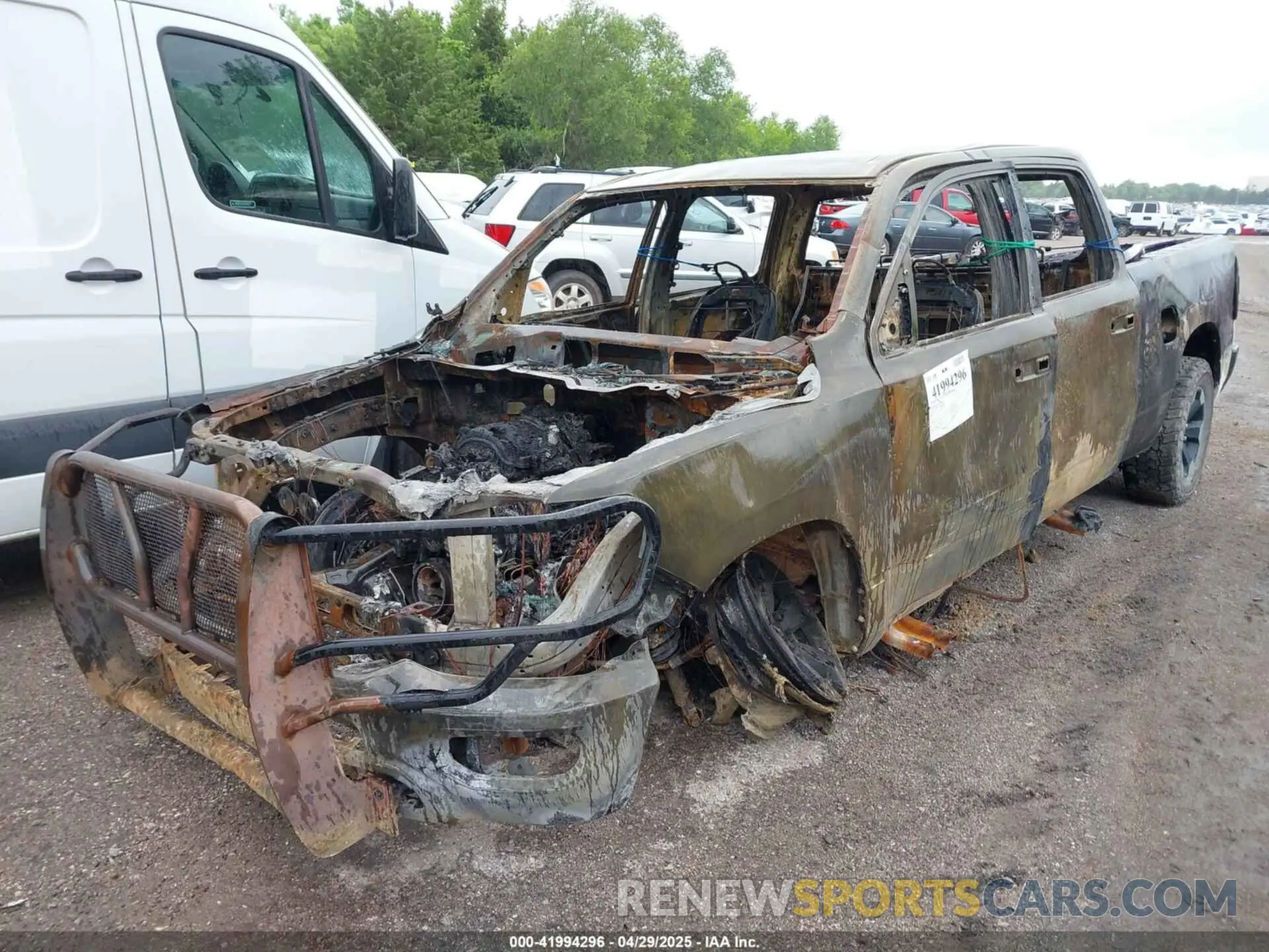 2 Photograph of a damaged car 1C6RRENT8NN451322 RAM 1500 2022