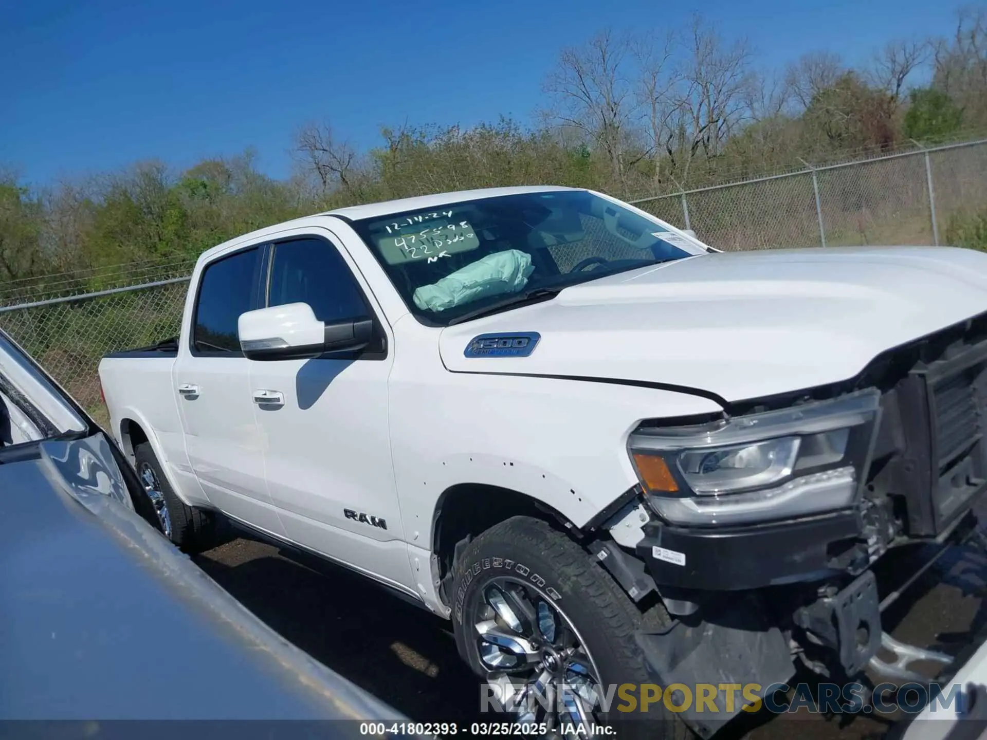 14 Photograph of a damaged car 1C6RRERT1NN475598 RAM 1500 2022