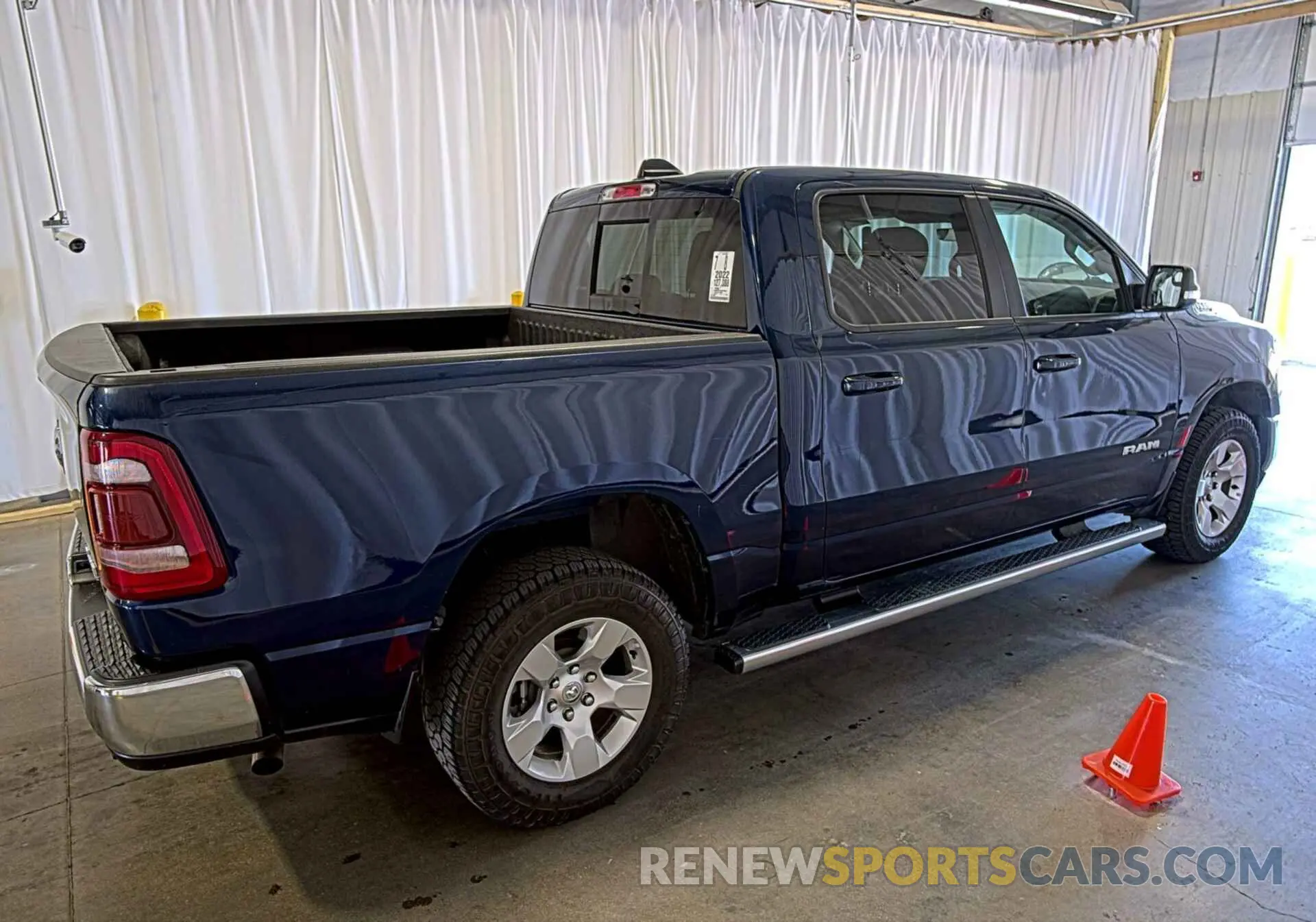 21 Photograph of a damaged car 1C6RRFFG1NN179042 RAM 1500 2022
