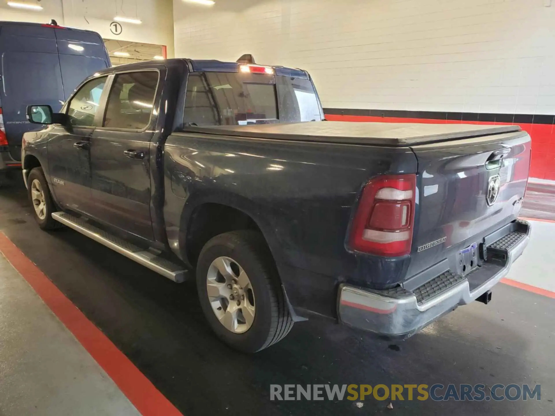 12 Photograph of a damaged car 1C6RRFFG1NN190932 RAM 1500 2022
