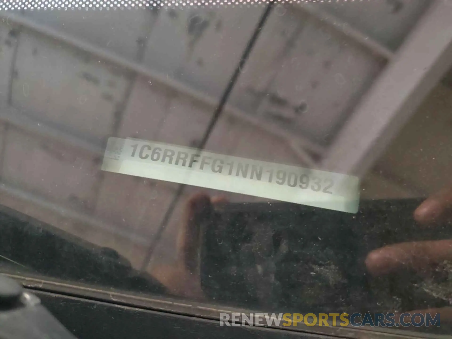 21 Photograph of a damaged car 1C6RRFFG1NN190932 RAM 1500 2022