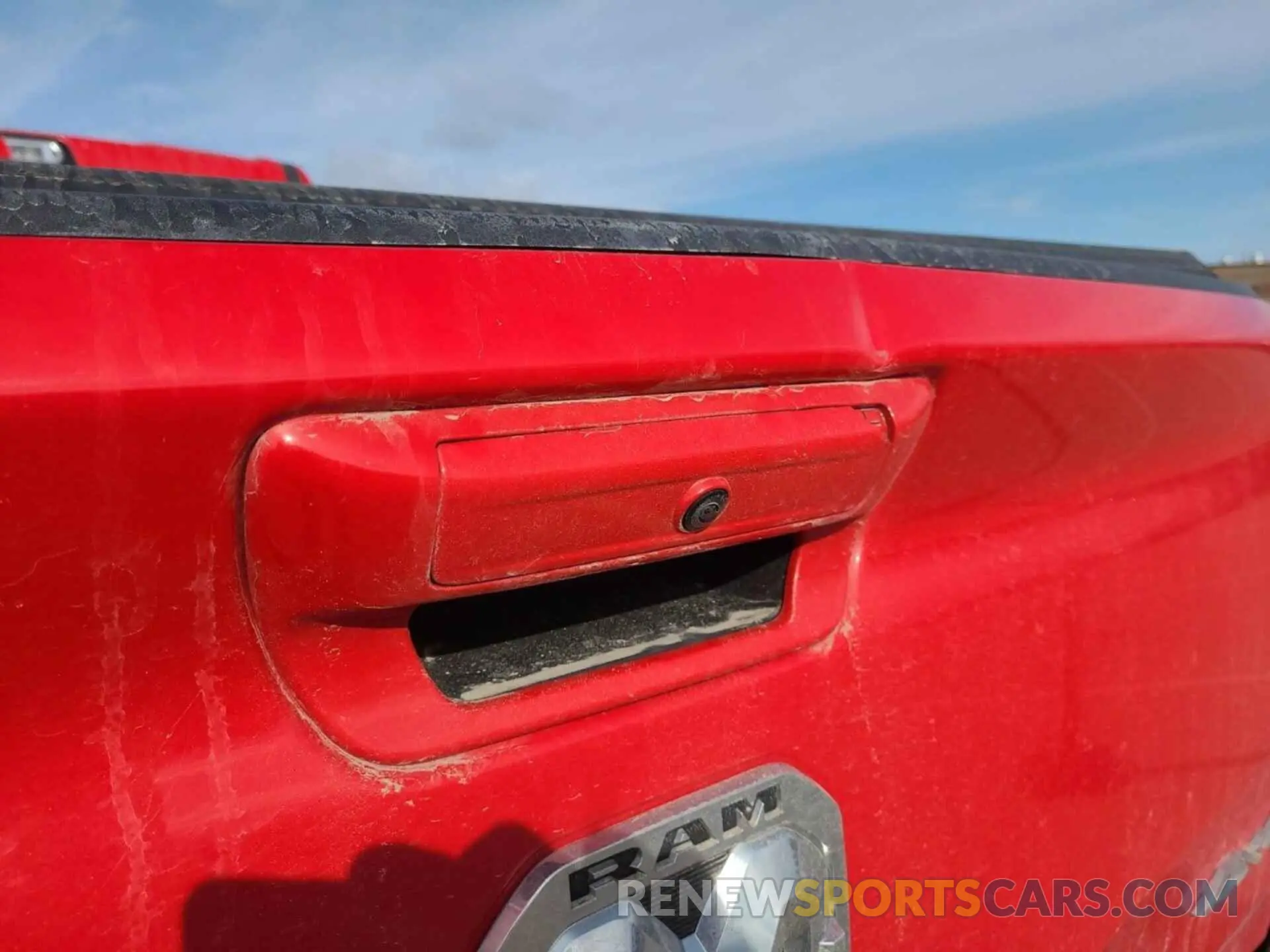1 Photograph of a damaged car 1C6RRFFG3NN383759 RAM 1500 2022