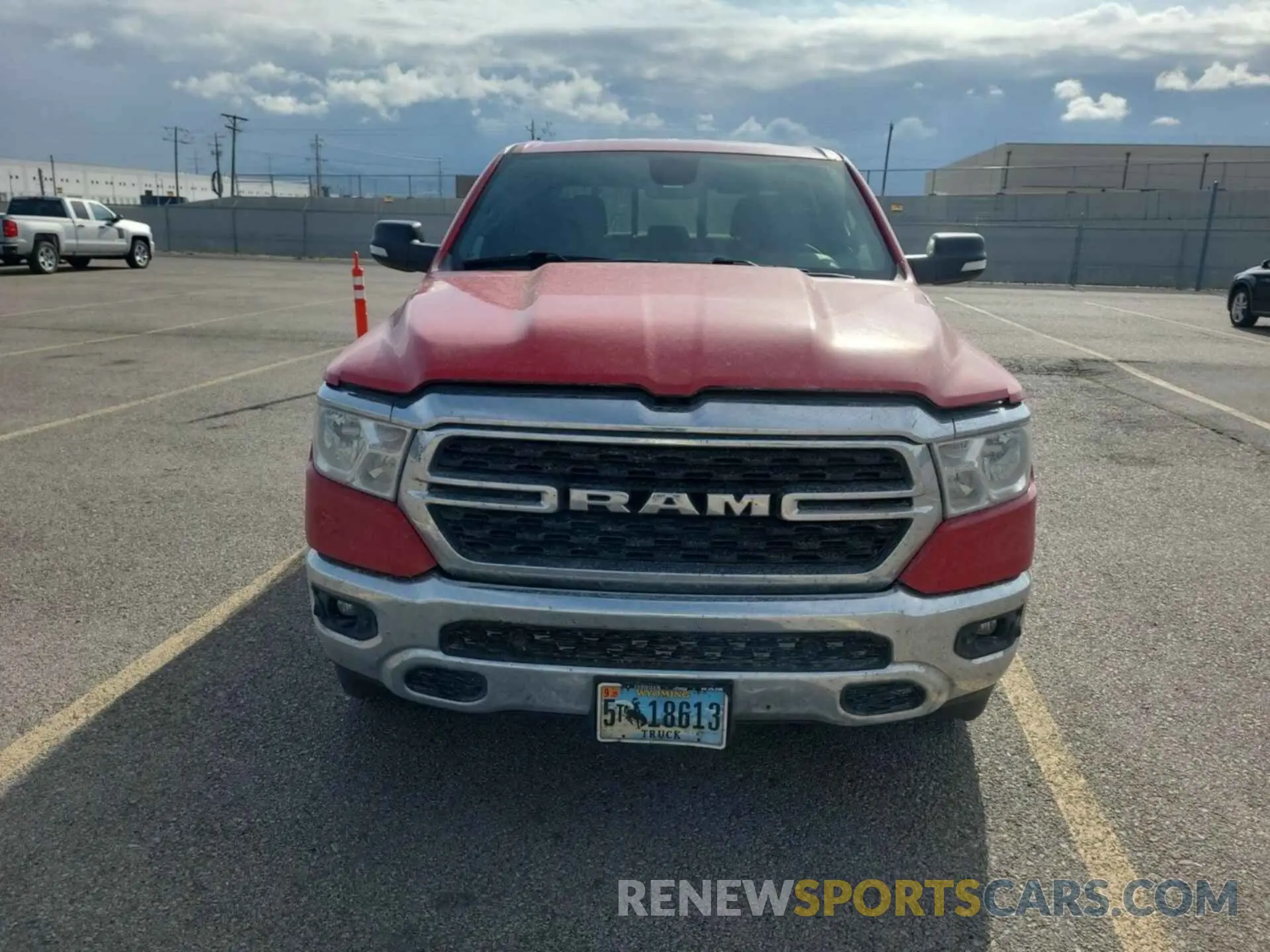 61 Photograph of a damaged car 1C6RRFFG3NN383759 RAM 1500 2022