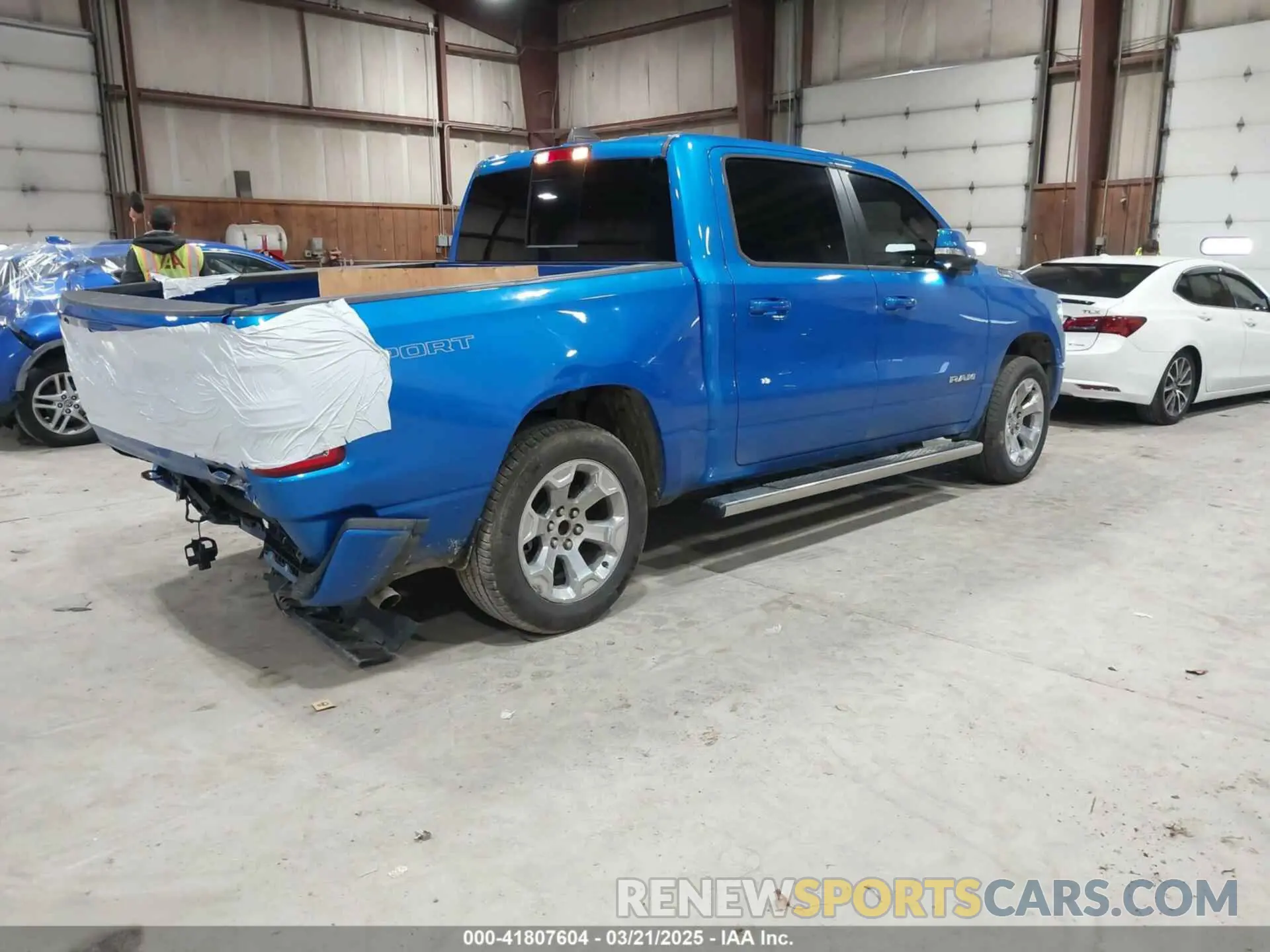 4 Photograph of a damaged car 1C6RRFFG4NN343089 RAM 1500 2022