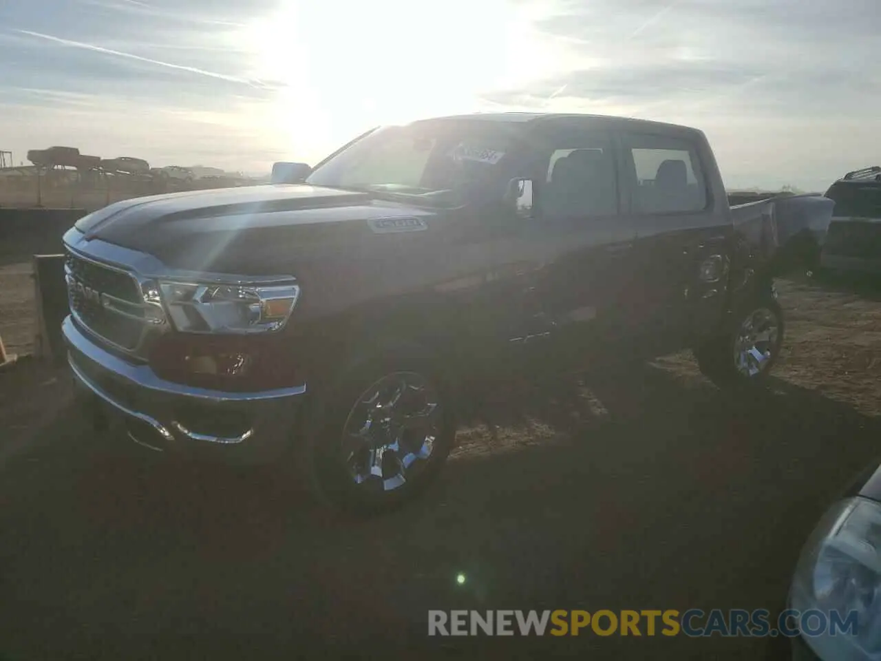 1 Photograph of a damaged car 1C6RRFFG4NN412279 RAM 1500 2022