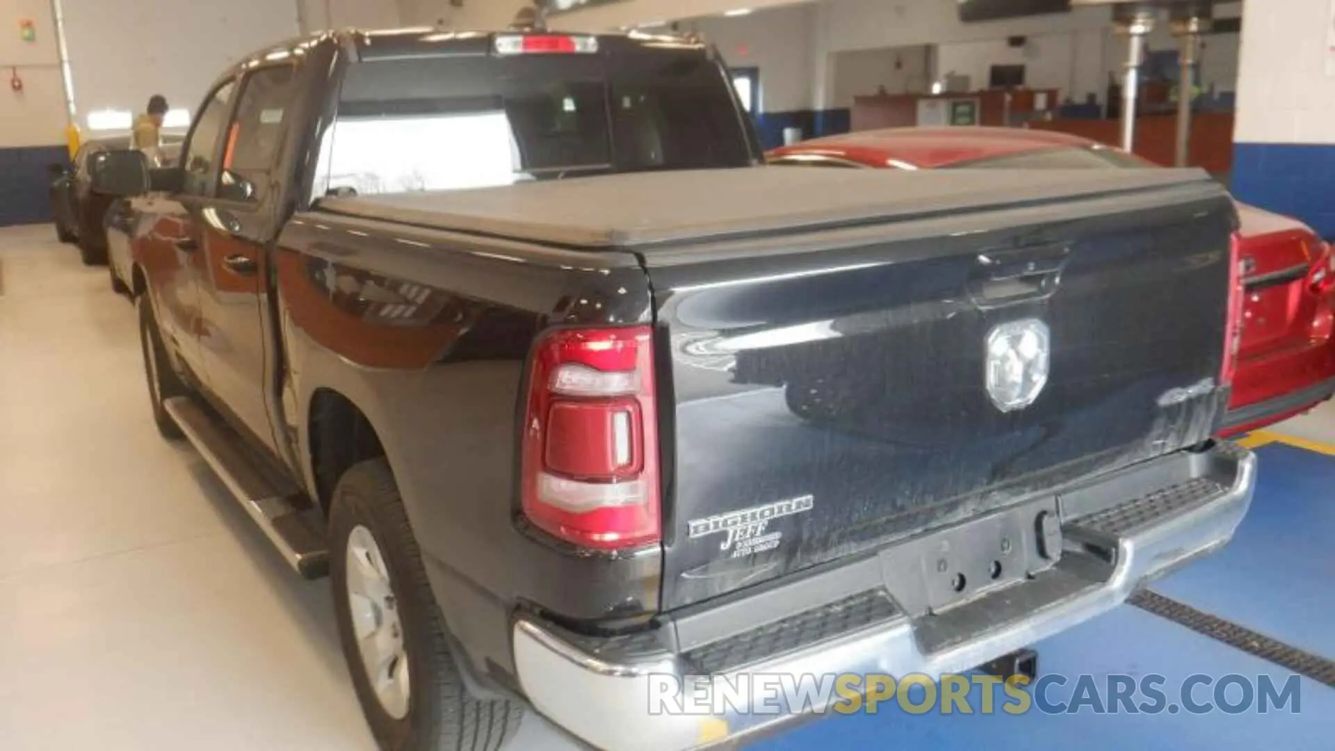 13 Photograph of a damaged car 1C6RRFFG6NN178999 RAM 1500 2022