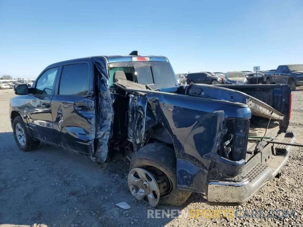 2 Photograph of a damaged car 1C6RRFFG9NN300707 RAM 1500 2022