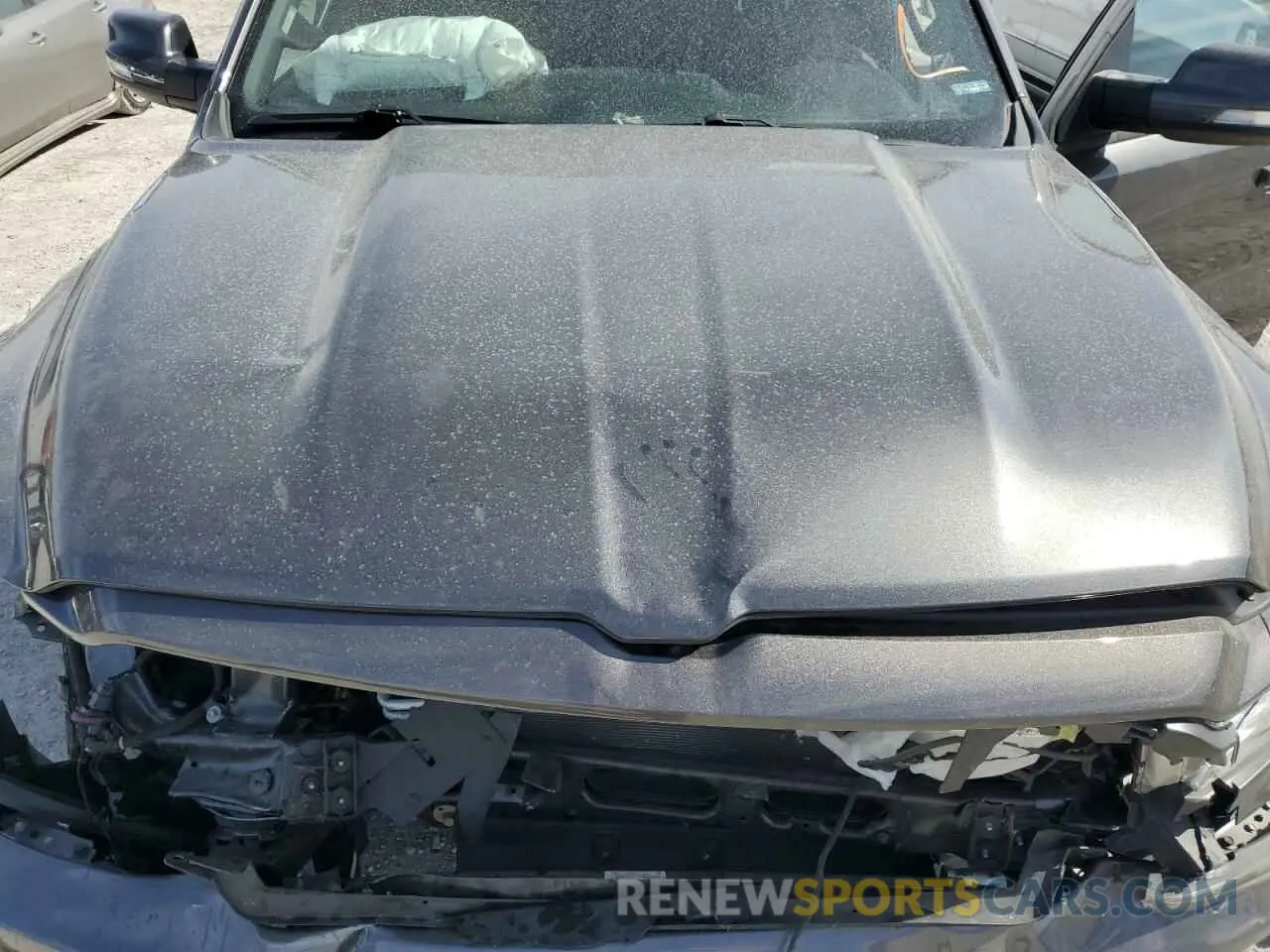 12 Photograph of a damaged car 1C6RRFMG1NN478128 RAM 1500 2022