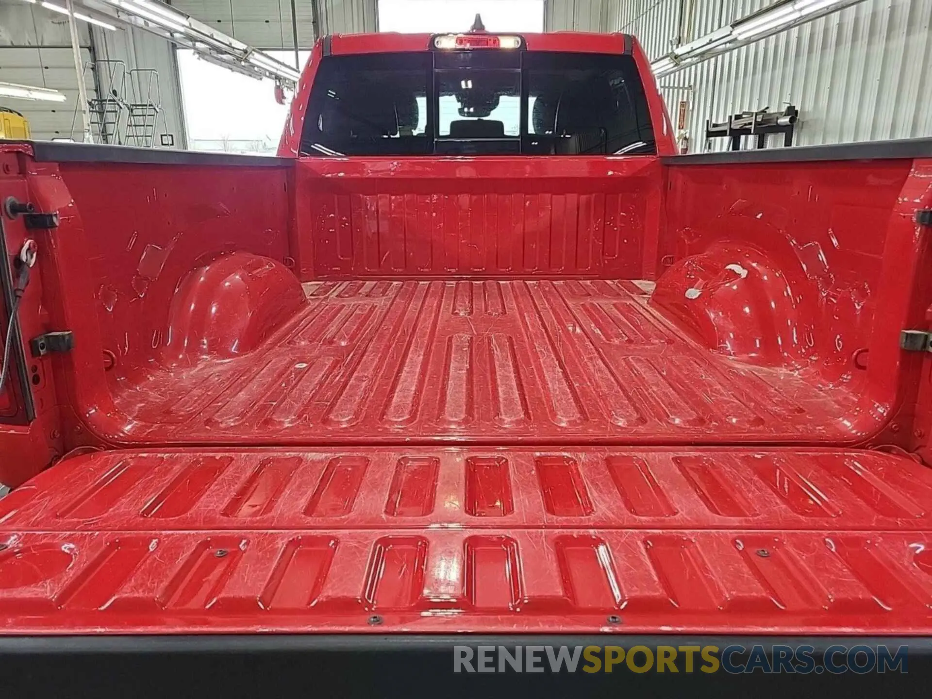 4 Photograph of a damaged car 1C6RRFRG0NN425719 RAM 1500 2022