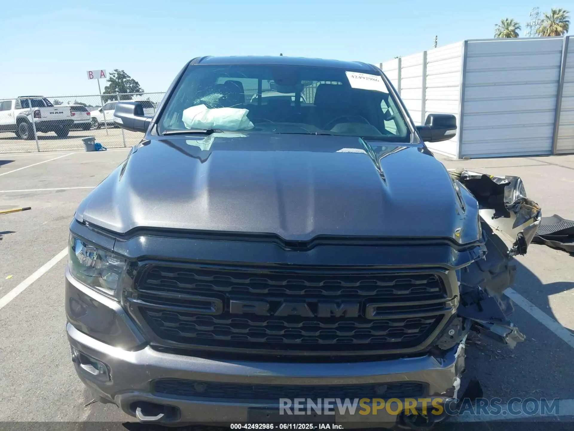 12 Photograph of a damaged car 1C6SRFBT3NN184201 RAM 1500 2022