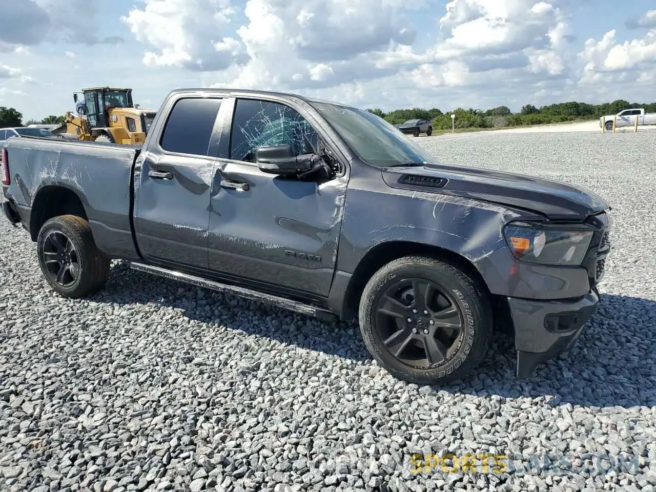 4 Photograph of a damaged car 1C6SRFBT8NN164011 RAM 1500 2022