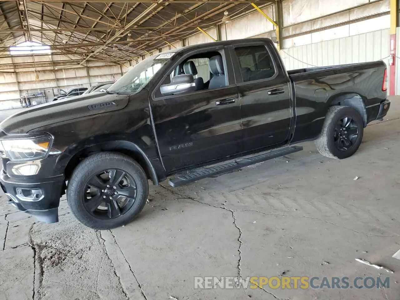 1 Photograph of a damaged car 1C6SRFBTXNN412193 RAM 1500 2022