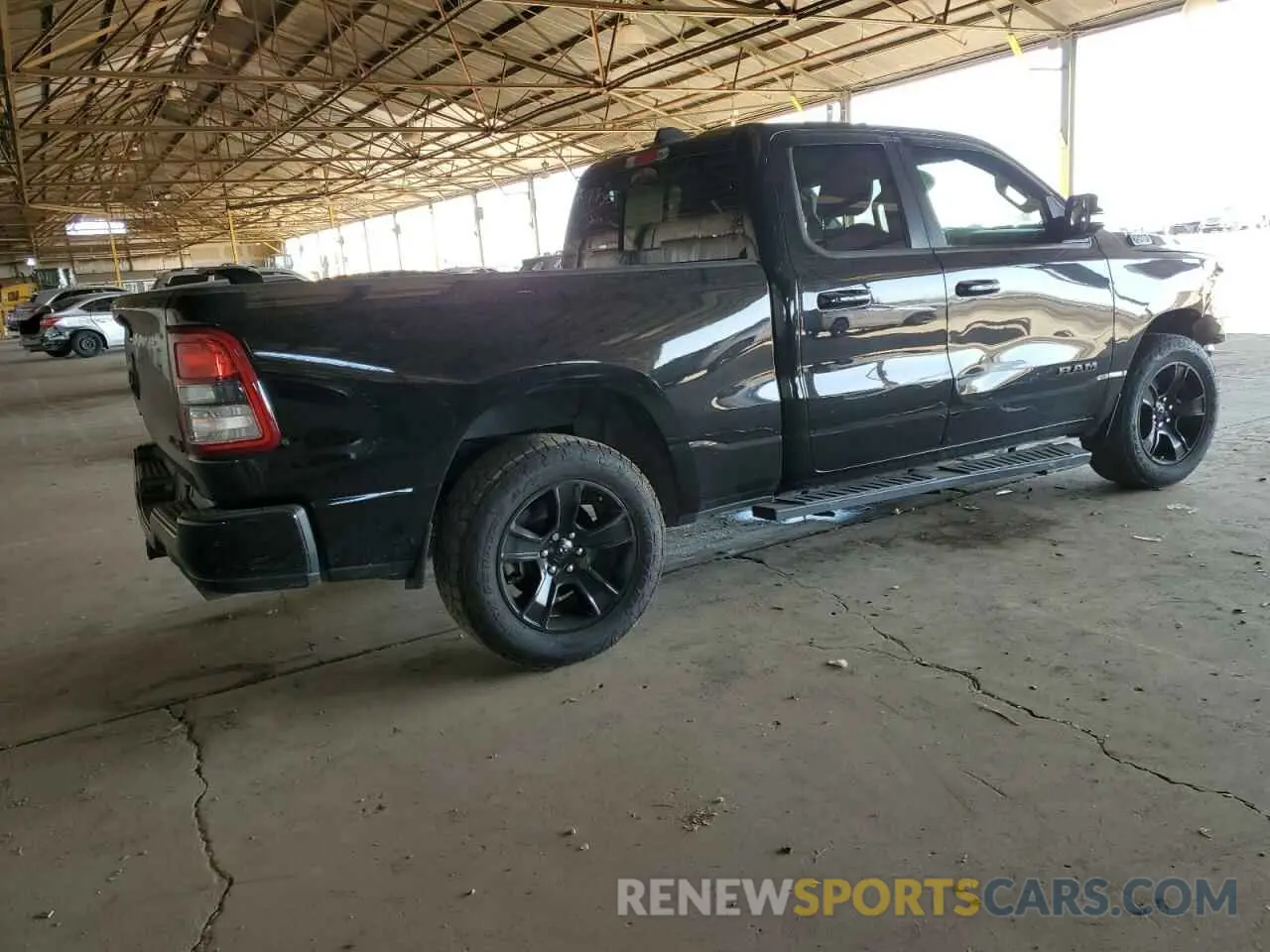 3 Photograph of a damaged car 1C6SRFBTXNN412193 RAM 1500 2022