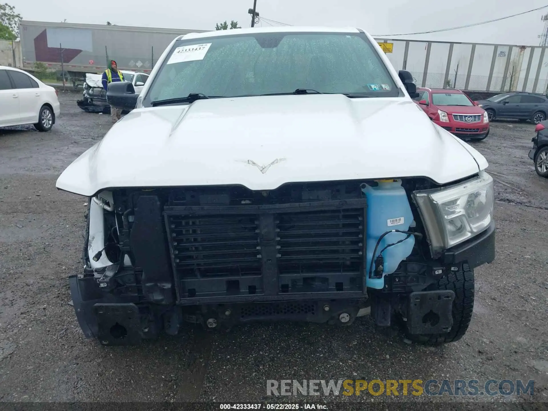 12 Photograph of a damaged car 1C6SRFCT2NN213959 RAM 1500 2022