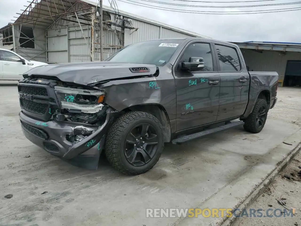 1 Photograph of a damaged car 1C6SRFFM7NN298608 RAM 1500 2022