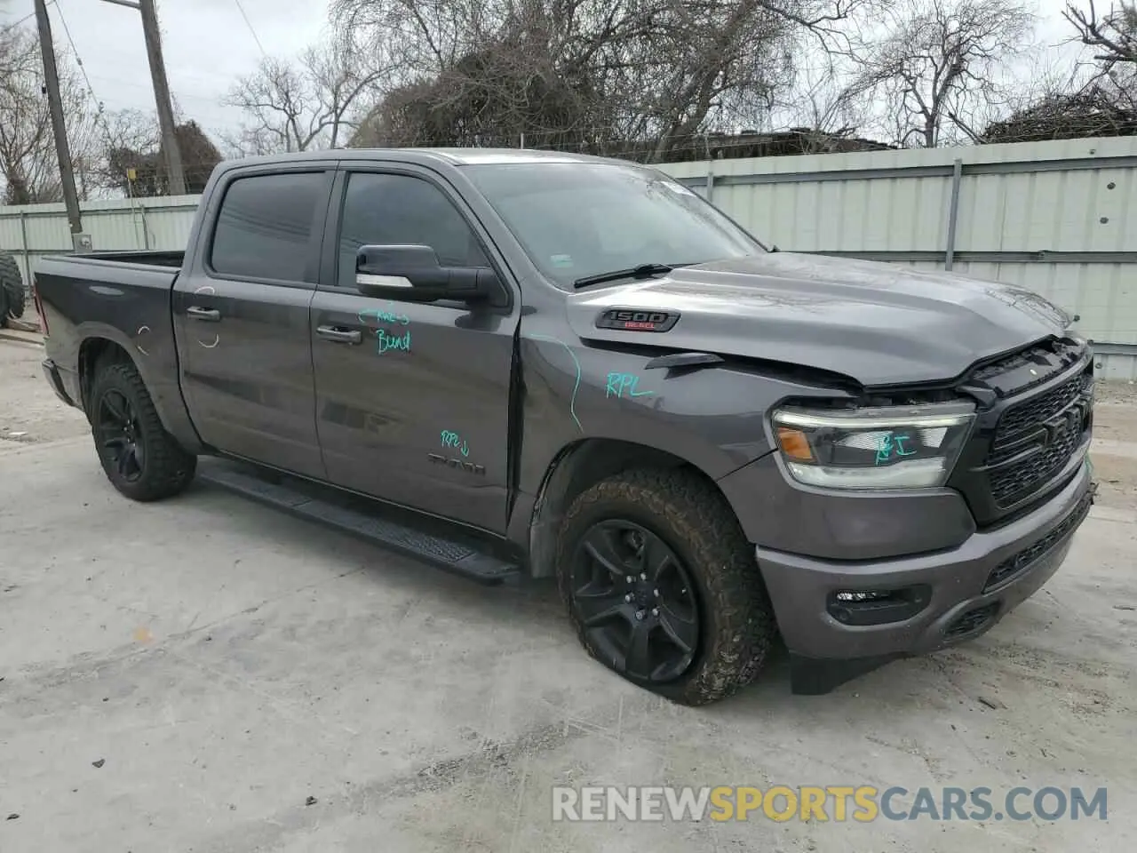 4 Photograph of a damaged car 1C6SRFFM7NN298608 RAM 1500 2022