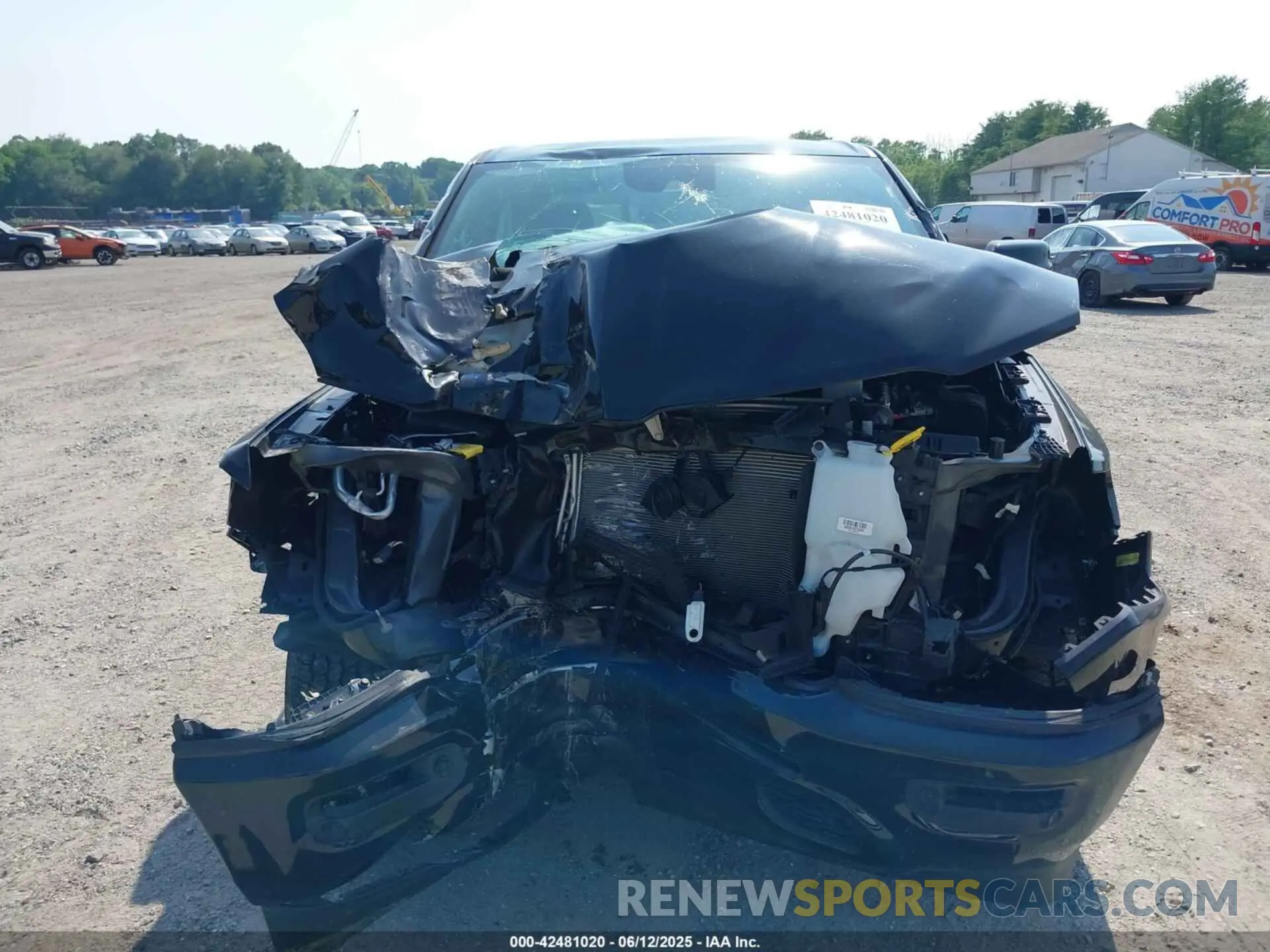 12 Photograph of a damaged car 1C6SRFFT0NN119106 RAM 1500 2022