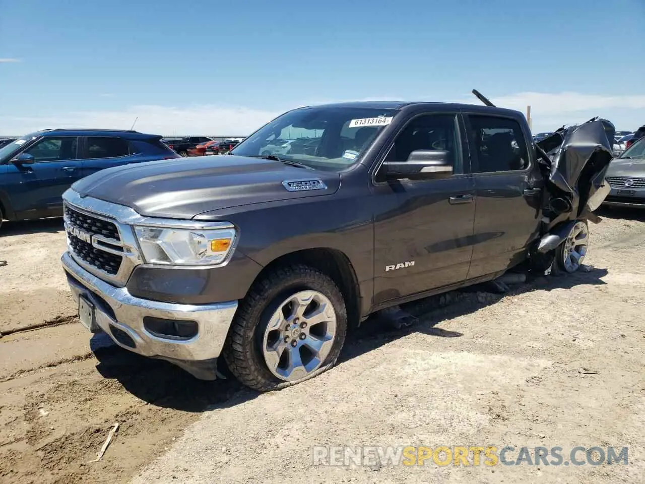 1 Photograph of a damaged car 1C6SRFFT0NN154812 RAM 1500 2022