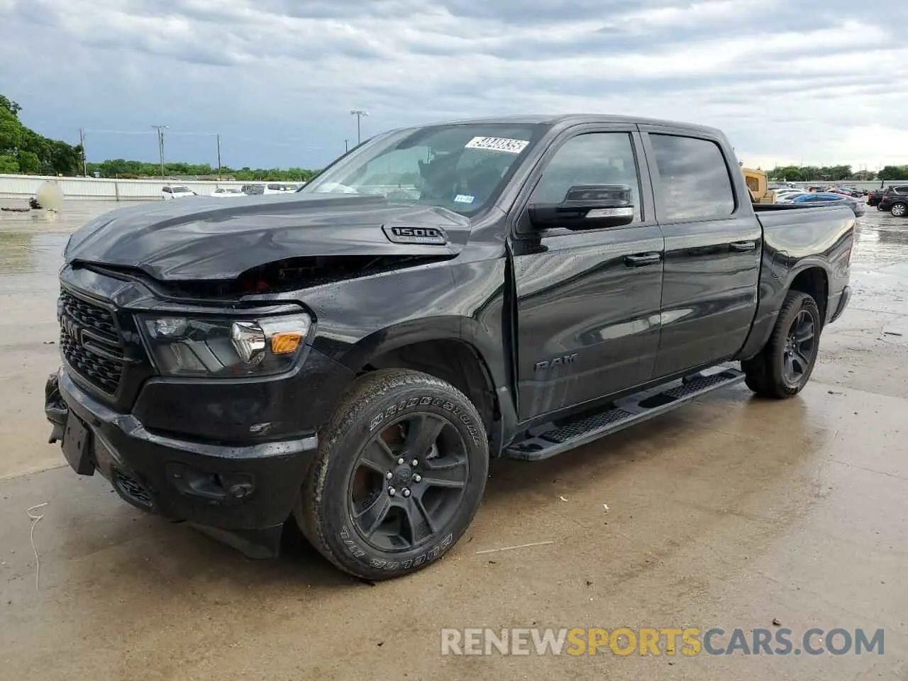 1 Photograph of a damaged car 1C6SRFFT1NN313174 RAM 1500 2022