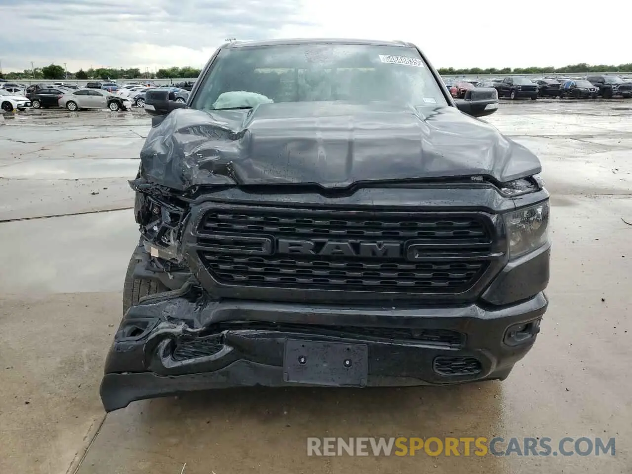 5 Photograph of a damaged car 1C6SRFFT1NN313174 RAM 1500 2022