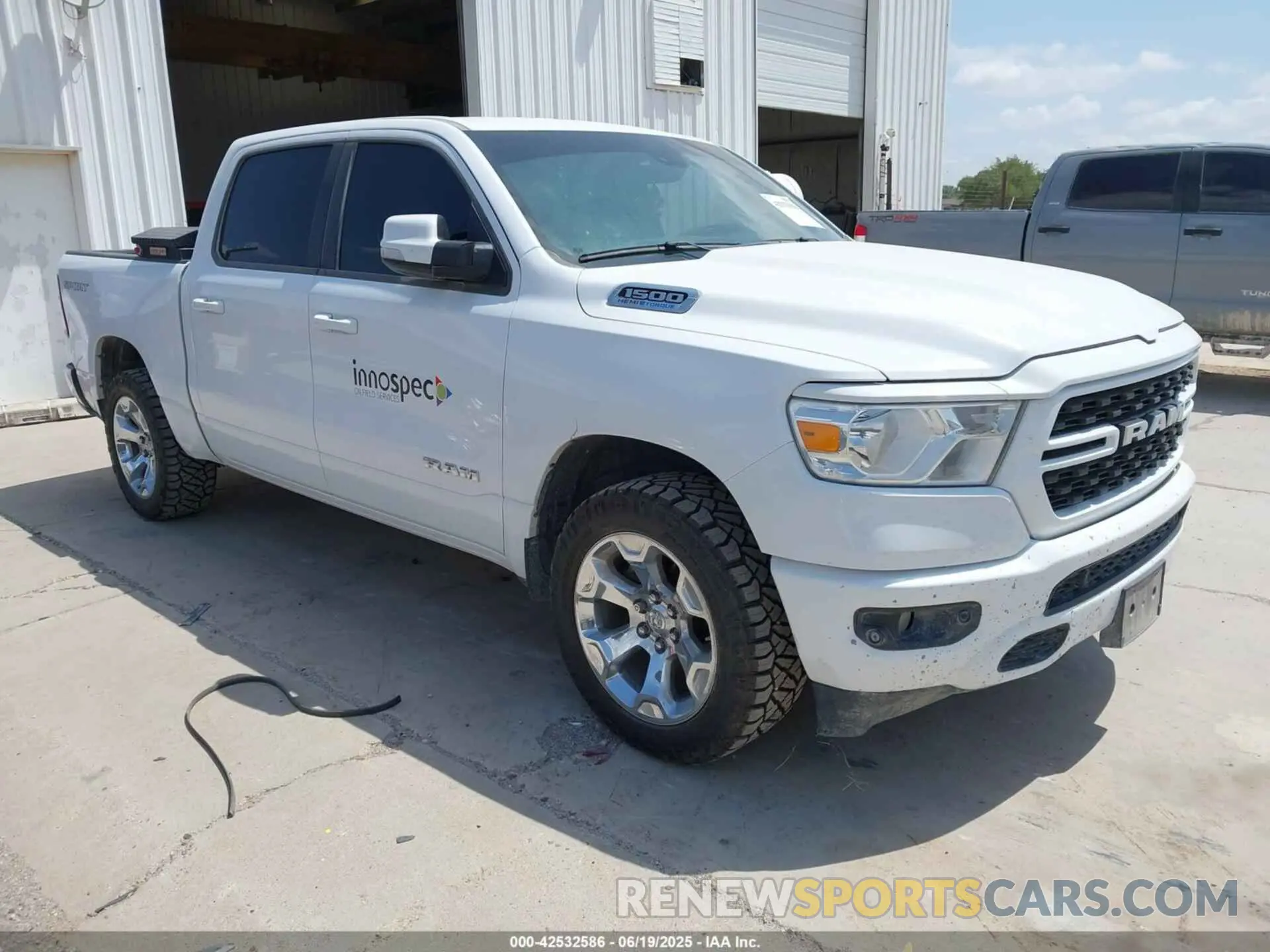 1 Photograph of a damaged car 1C6SRFFT2NN317525 RAM 1500 2022