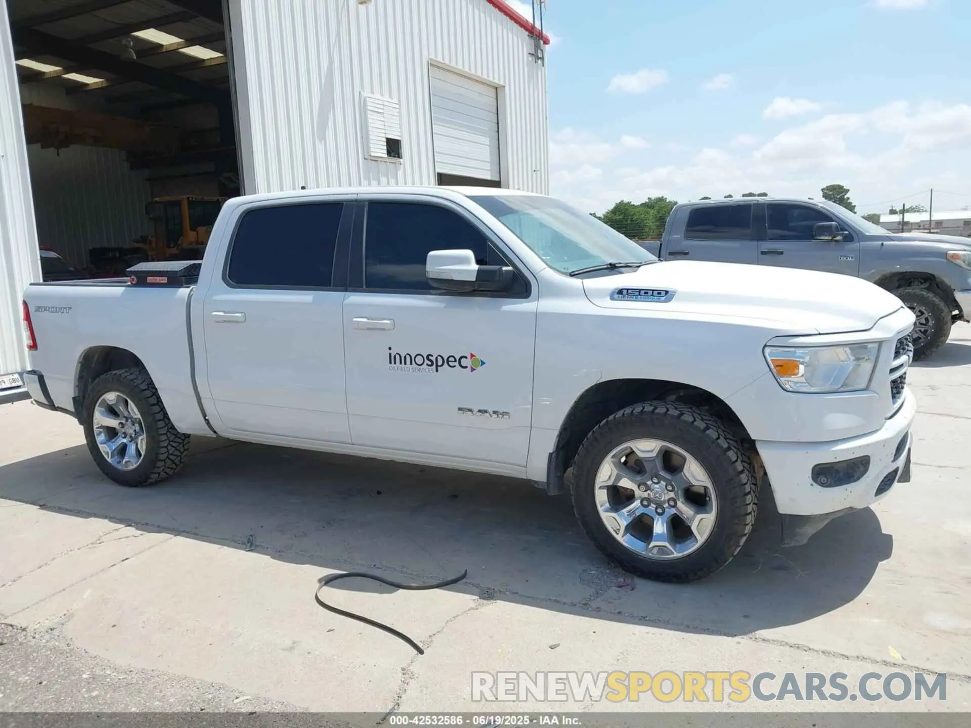 13 Photograph of a damaged car 1C6SRFFT2NN317525 RAM 1500 2022