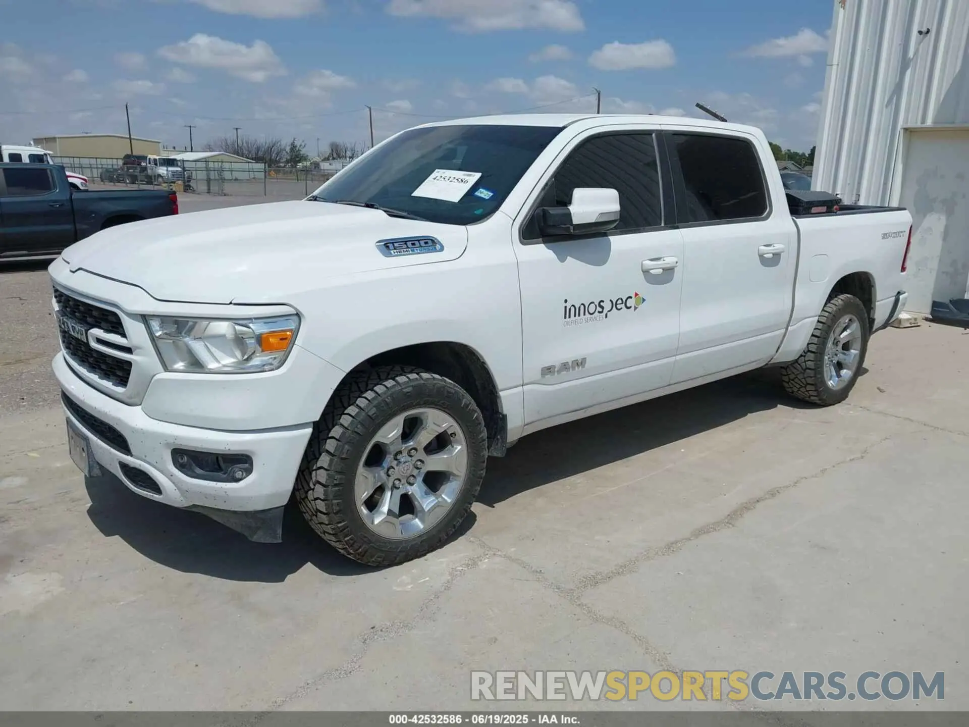 2 Photograph of a damaged car 1C6SRFFT2NN317525 RAM 1500 2022