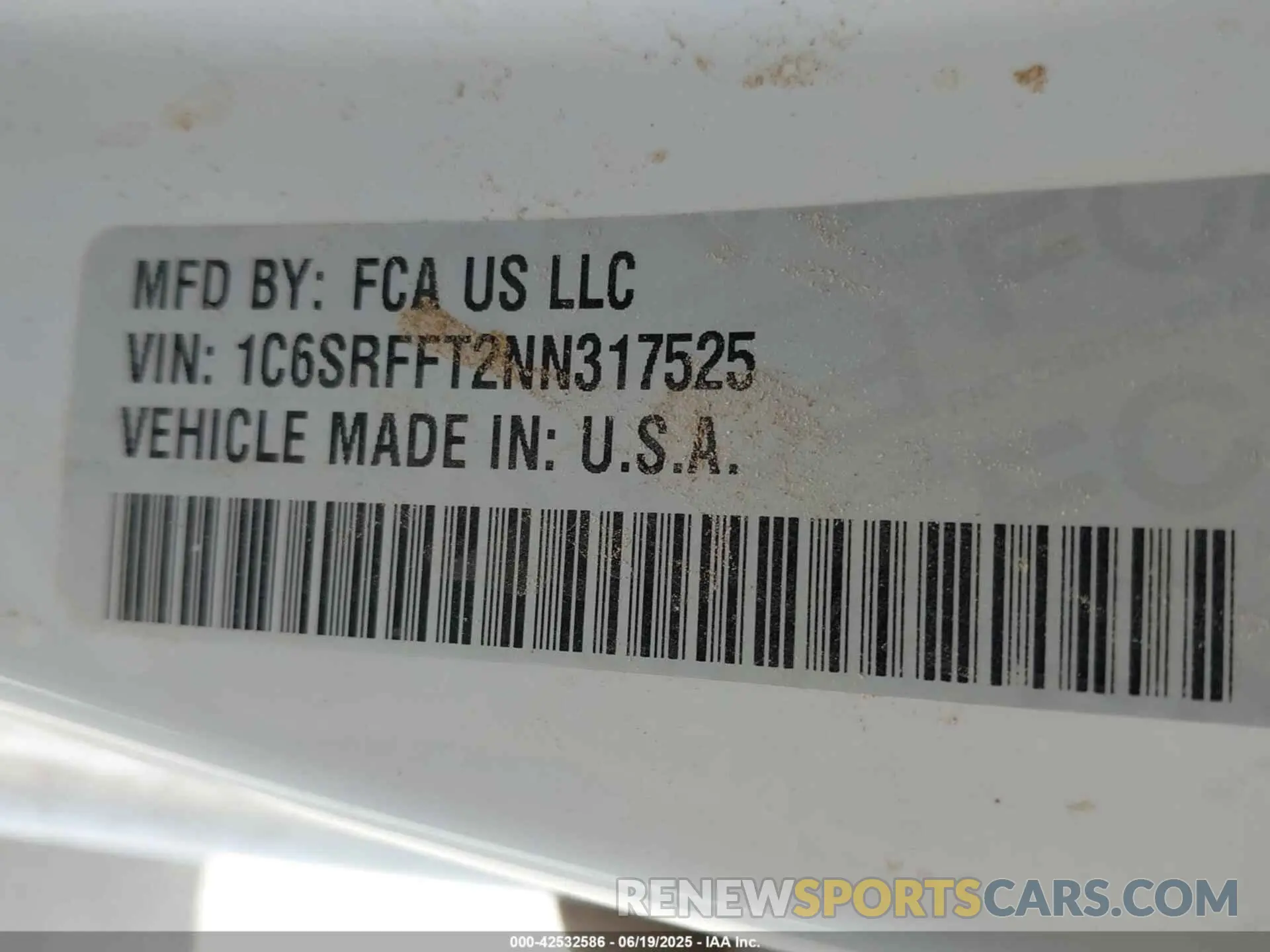 9 Photograph of a damaged car 1C6SRFFT2NN317525 RAM 1500 2022