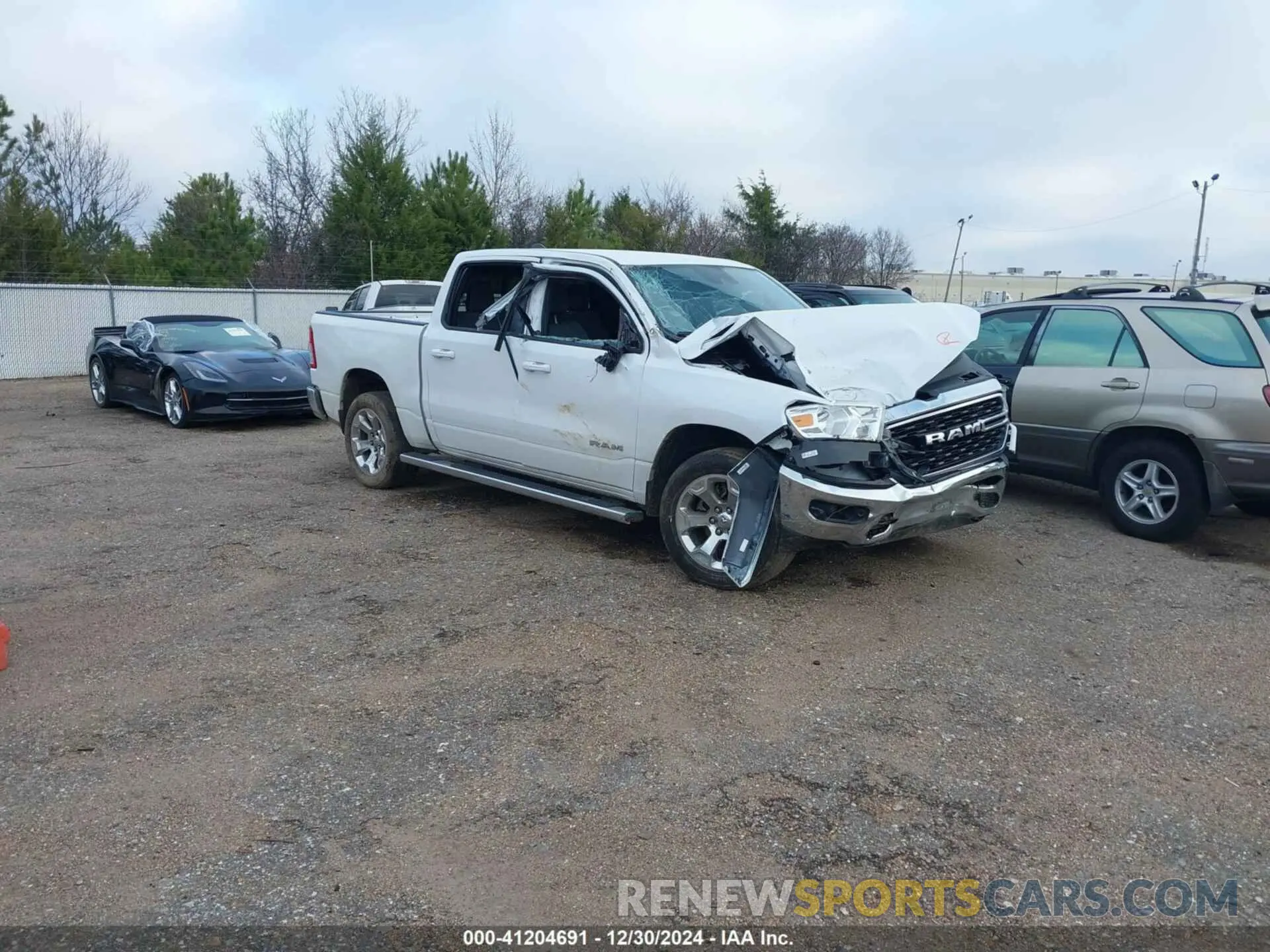 1 Photograph of a damaged car 1C6SRFFT2NN320943 RAM 1500 2022