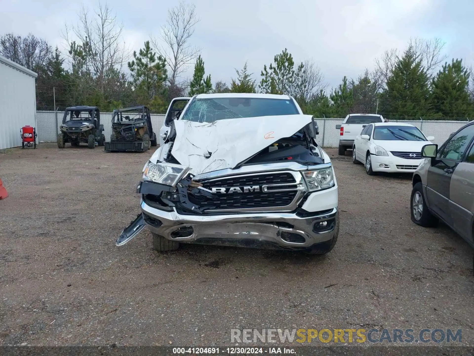 12 Photograph of a damaged car 1C6SRFFT2NN320943 RAM 1500 2022