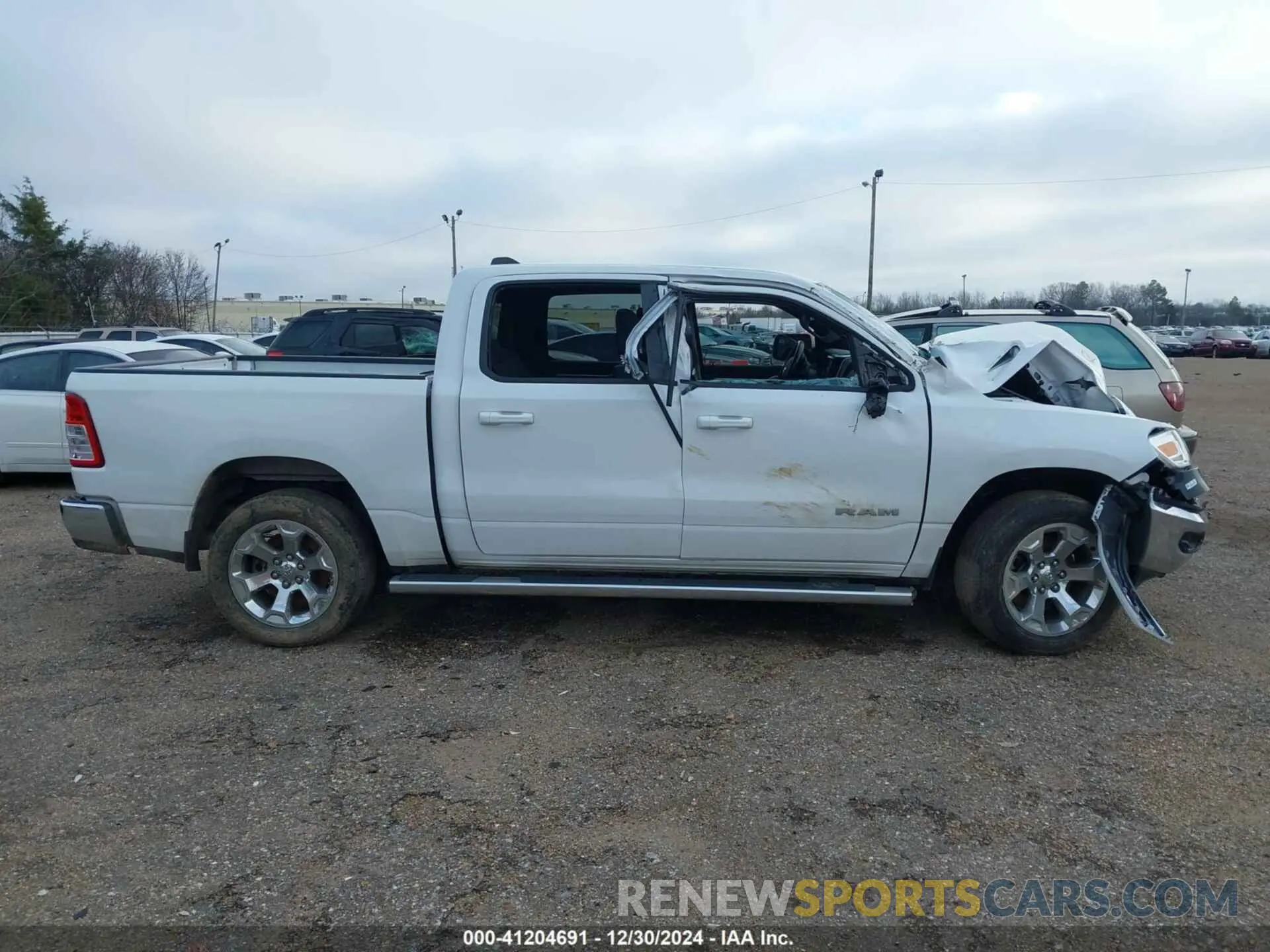 13 Photograph of a damaged car 1C6SRFFT2NN320943 RAM 1500 2022