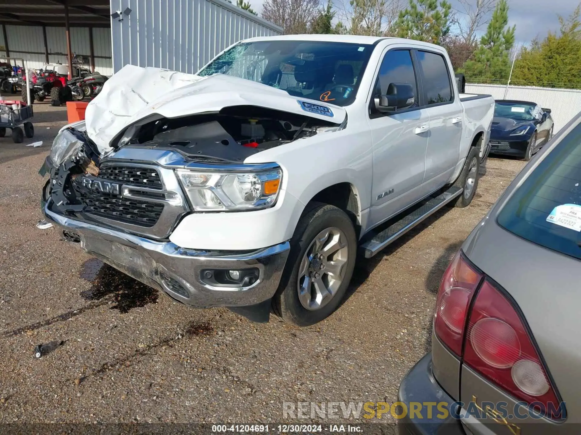 2 Photograph of a damaged car 1C6SRFFT2NN320943 RAM 1500 2022