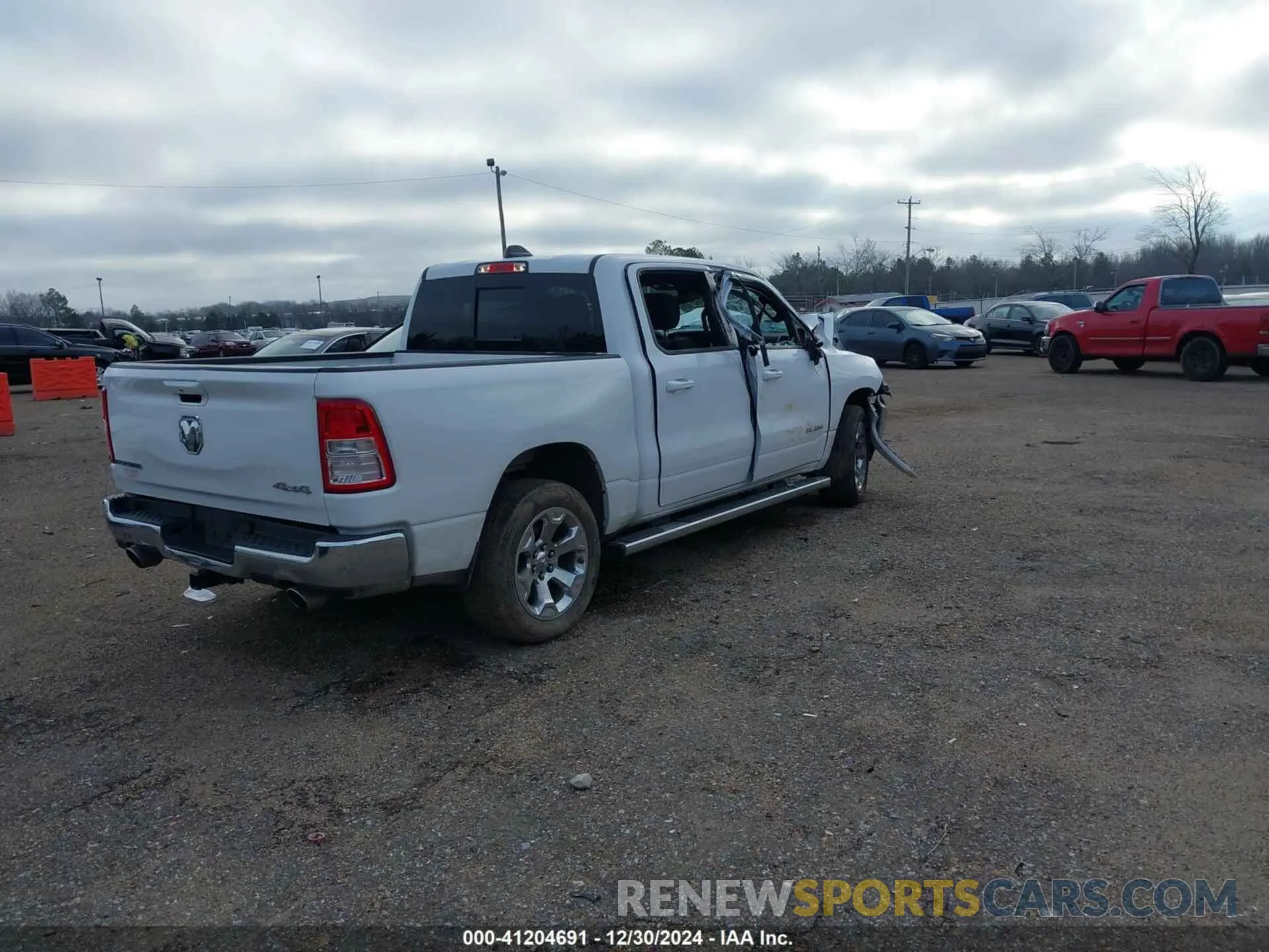4 Photograph of a damaged car 1C6SRFFT2NN320943 RAM 1500 2022