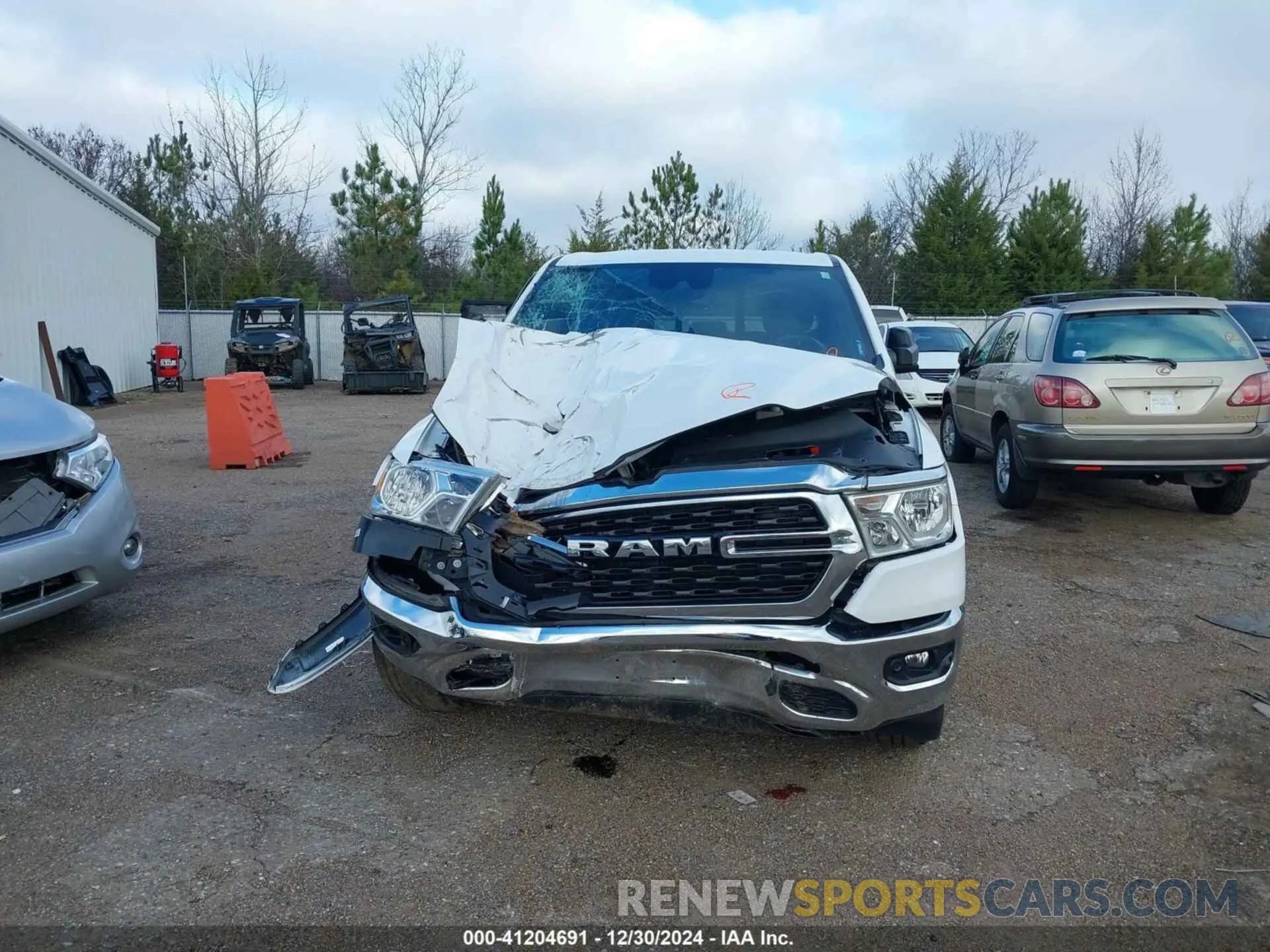 6 Photograph of a damaged car 1C6SRFFT2NN320943 RAM 1500 2022