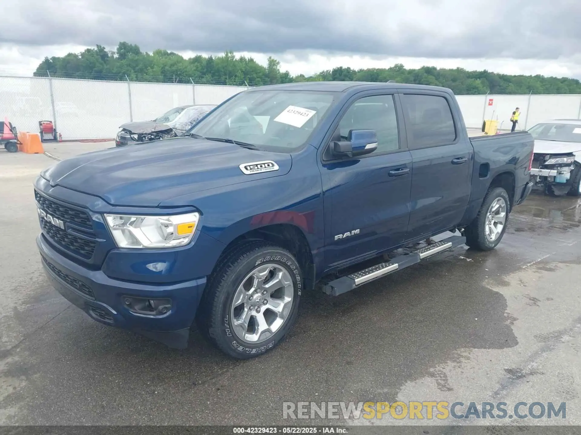 2 Photograph of a damaged car 1C6SRFFT2NN428978 RAM 1500 2022