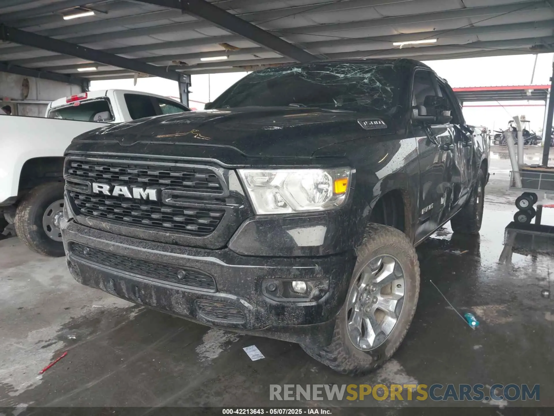 2 Photograph of a damaged car 1C6SRFFT3NN406309 RAM 1500 2022