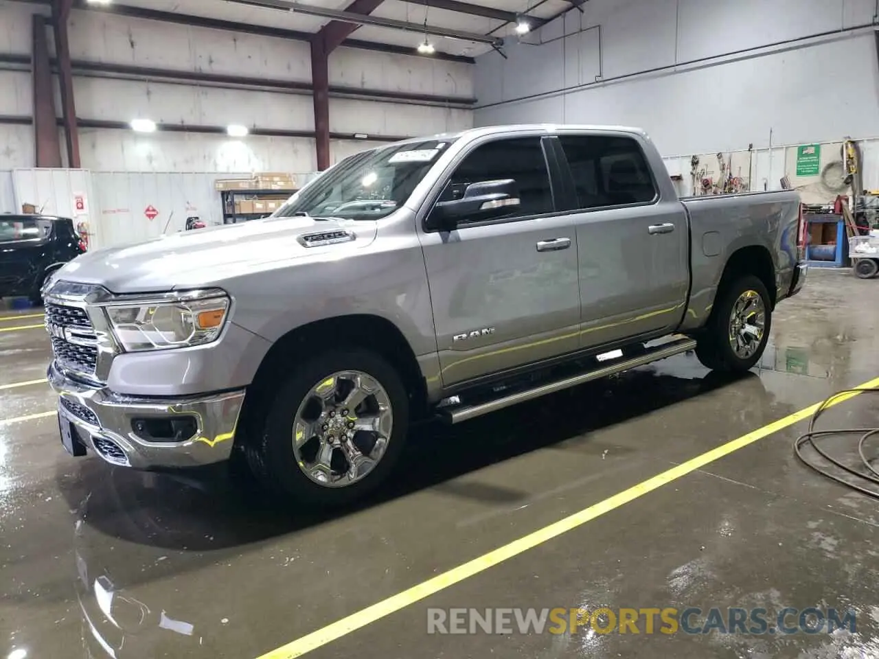 1 Photograph of a damaged car 1C6SRFFT3NN411980 RAM 1500 2022
