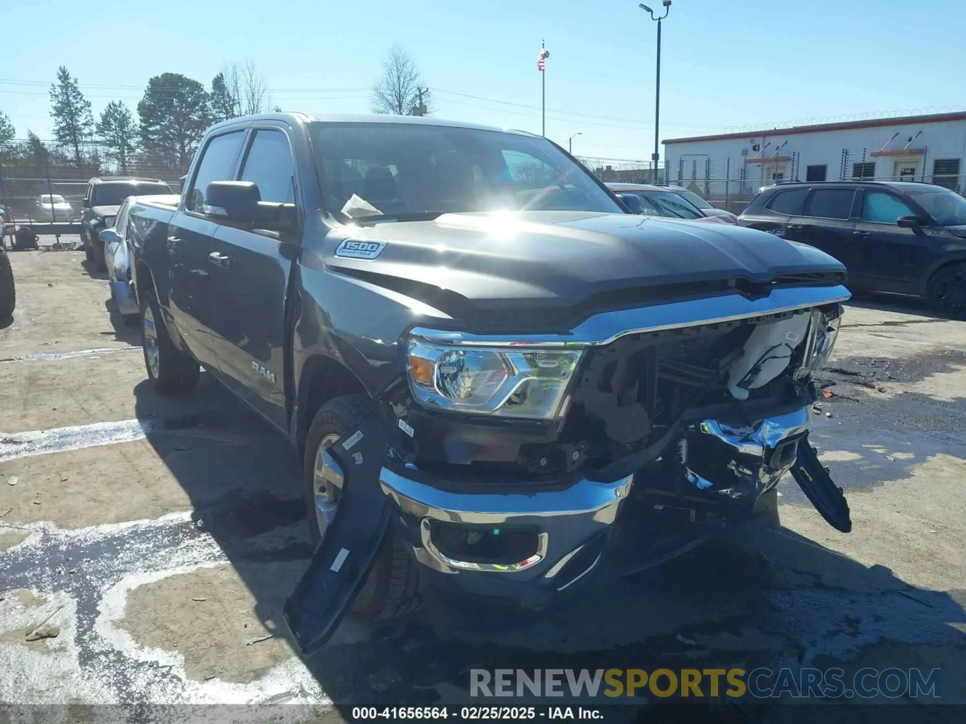1 Photograph of a damaged car 1C6SRFFT4NN428027 RAM 1500 2022